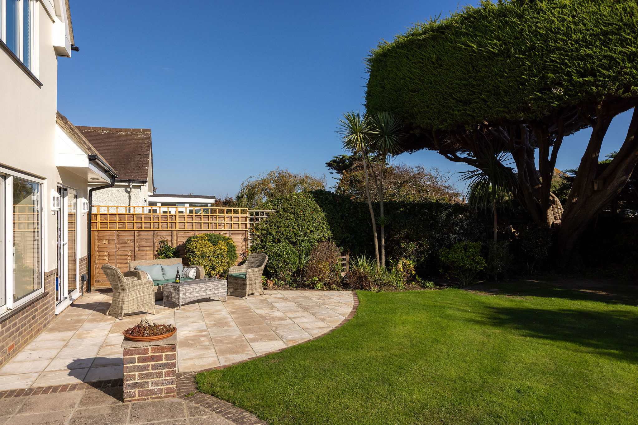 Enjoy a sunny spot in the enclosed garden.