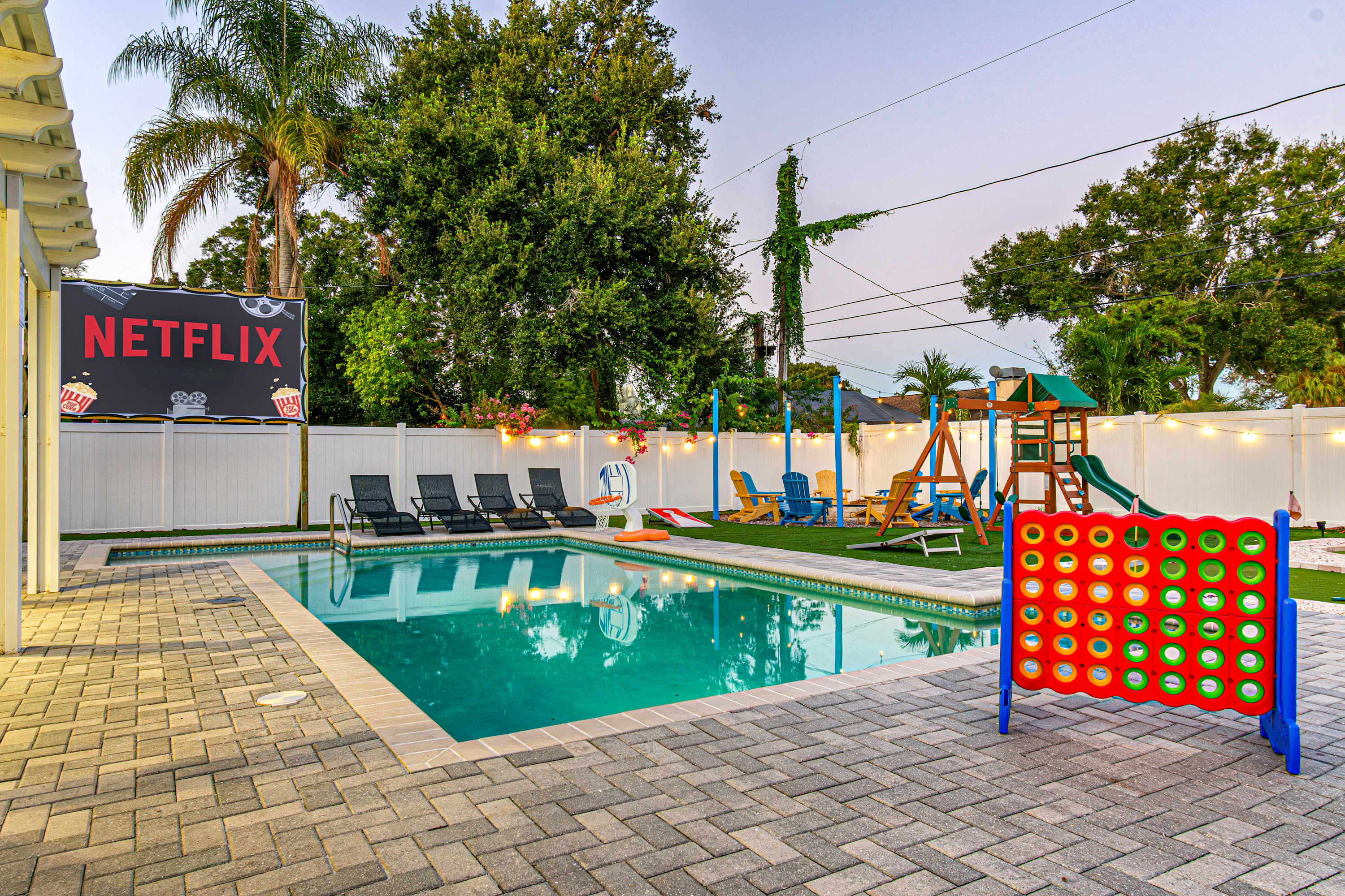 Saltwater pool area featuring the backyard entertainment area. This also includes poolside game options