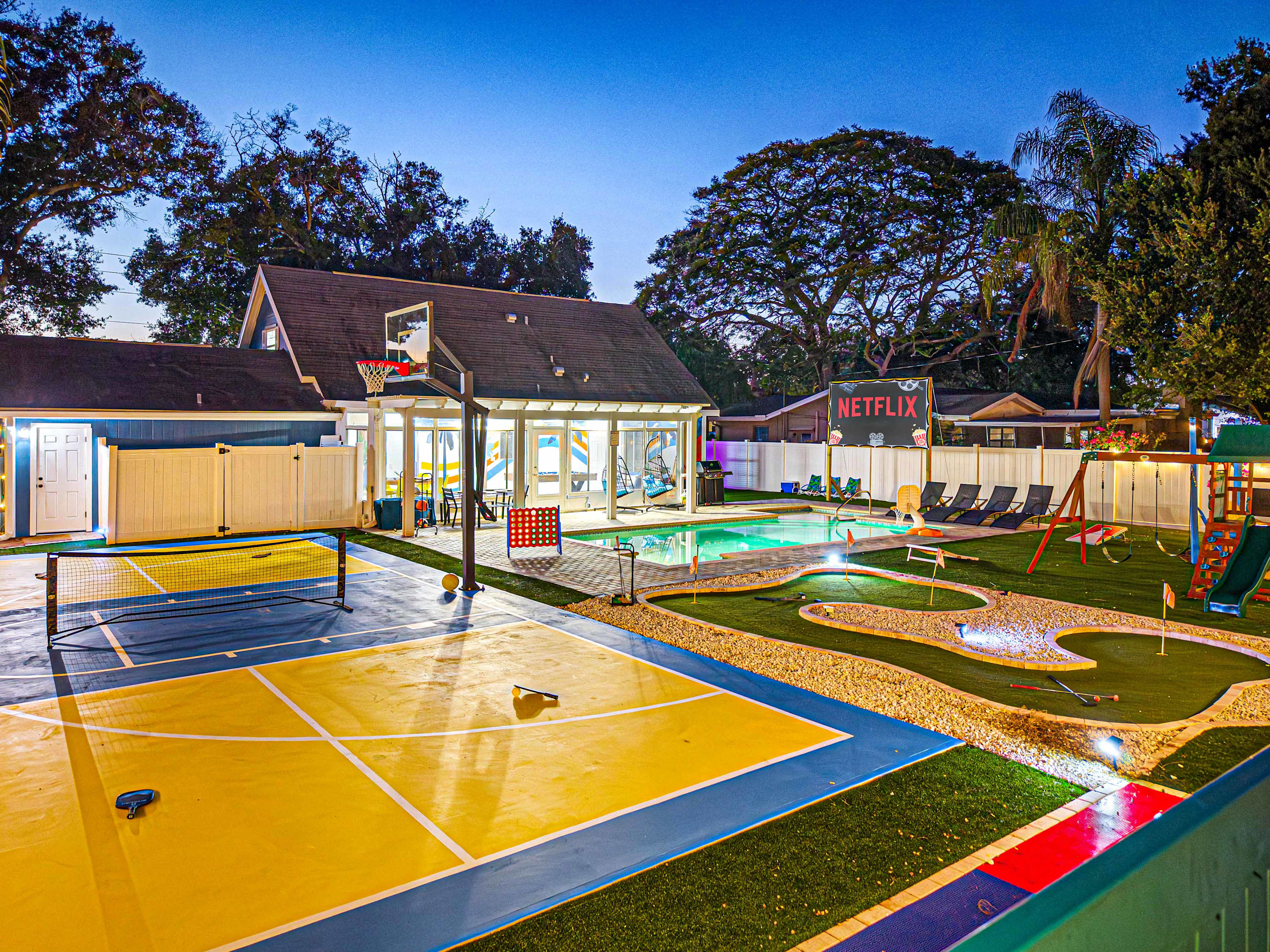 Backyard Amenities. Basketball + Pickleball court, saltwater pool, minigolf. kids' play area.