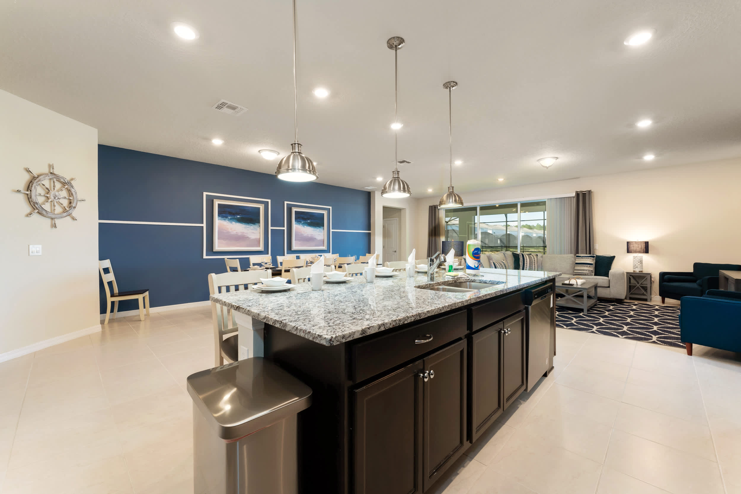 Experience luxury in this open-plan kitchen and living area, perfect for gatherings with family and friends.