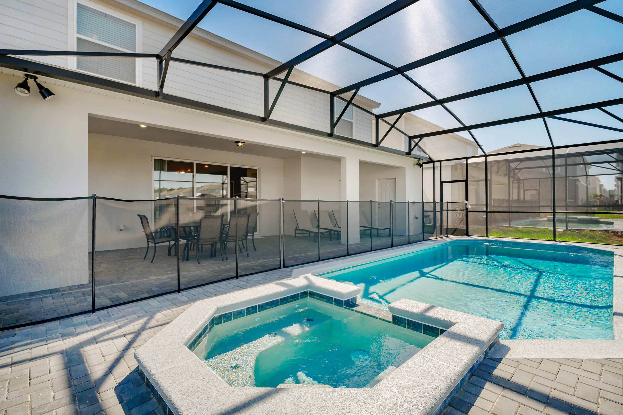 Relax in your private pool and hot tub, perfect for family gatherings and sunny afternoons.