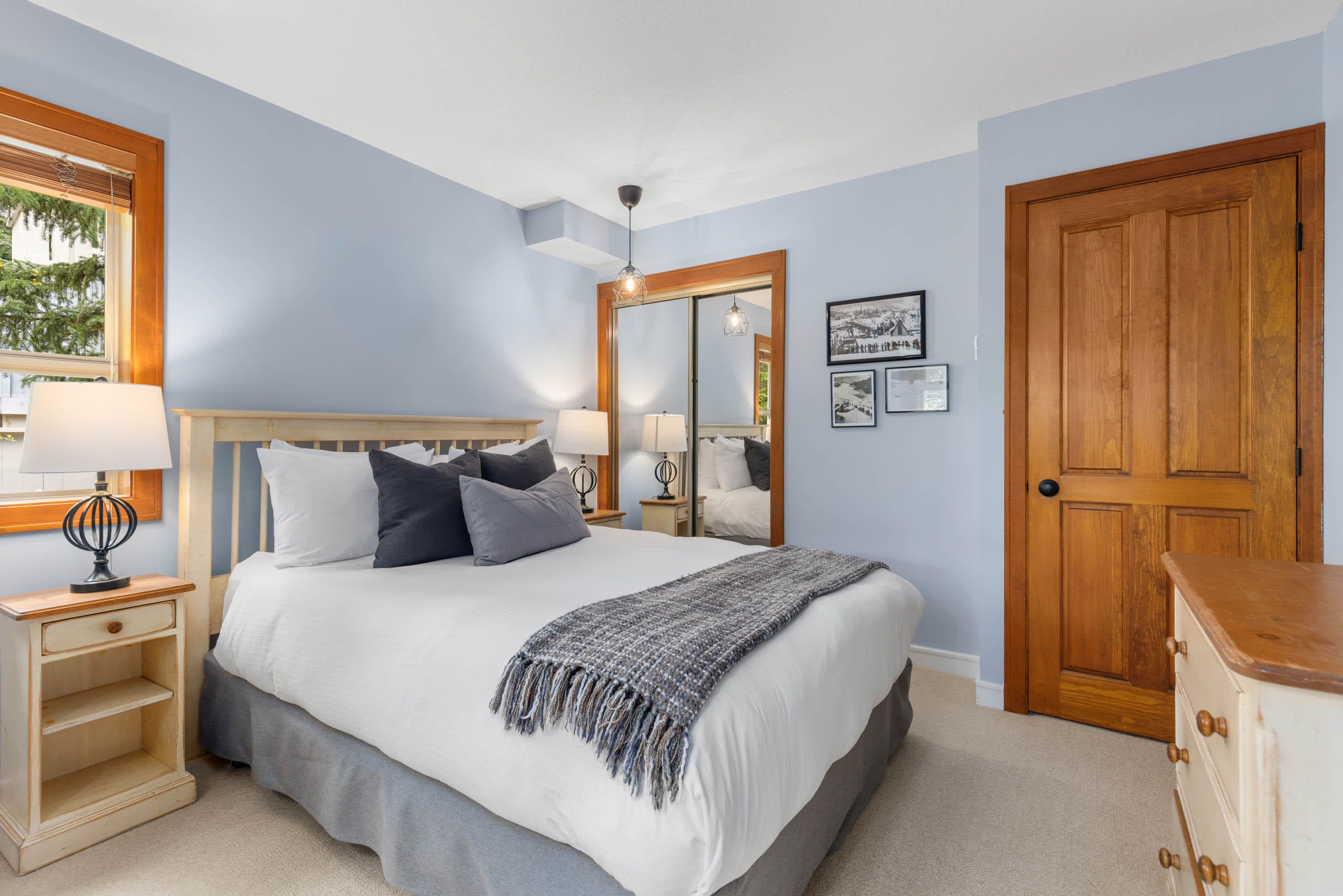 - Peaceful bedroom with soft bedding and calming tones 
- Forest views through bright windows for a refreshing morning 
- Designed for restful nights after mountain adventures 
