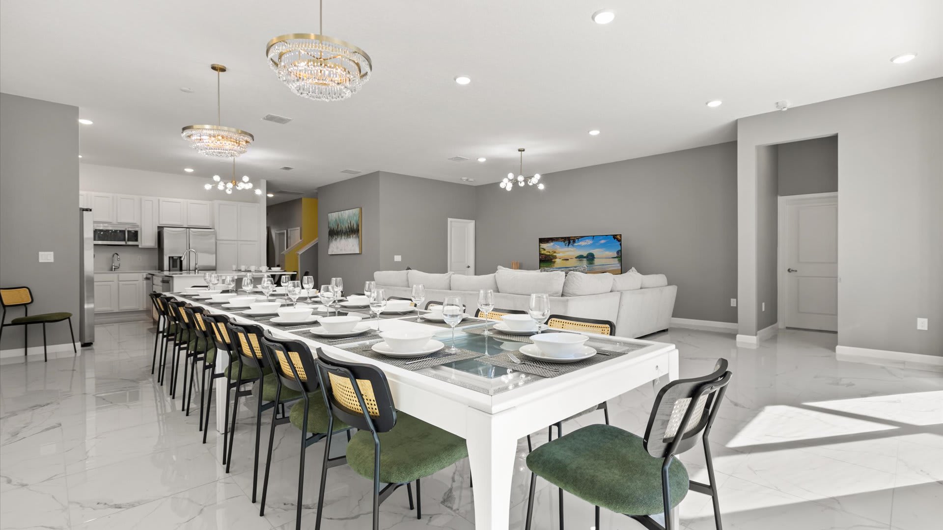 Dining Area: Gather around the oversized dining table with seating for 24 — perfect for group dinners and celebrations.