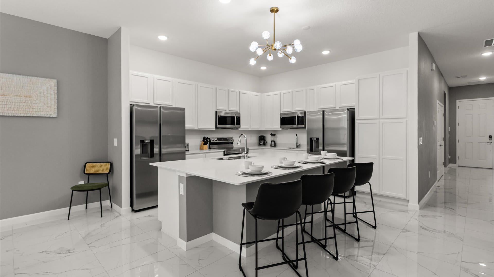 Kitchen: Fully equipped modern kitchen with stainless steel appliances, ample counter space, and everything you need for home-cooked meals.