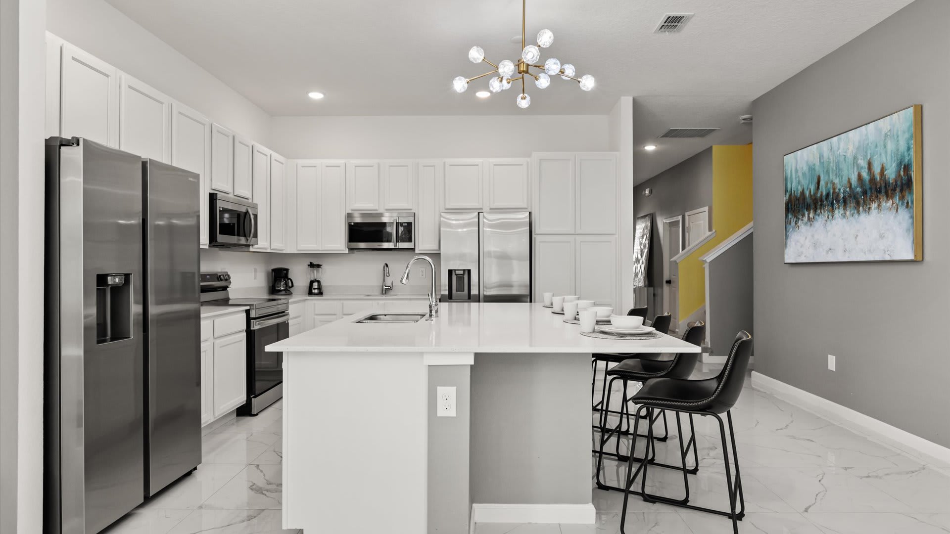 Kitchen: Fully equipped modern kitchen with stainless steel appliances, ample counter space, and everything you need for home-cooked meals.