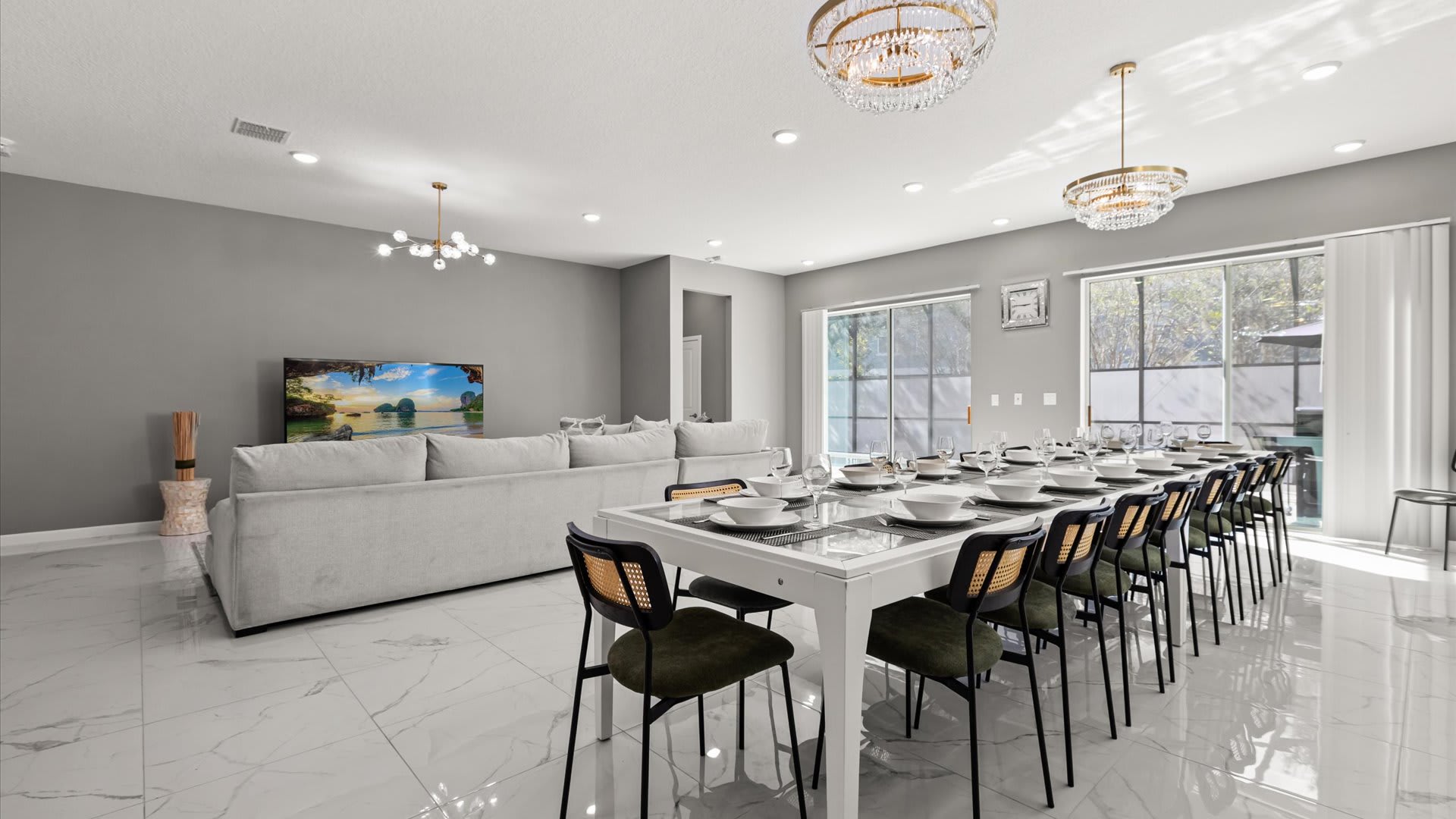 Dining Area: Gather around the oversized dining table with seating for 24 — perfect for group dinners and celebrations.