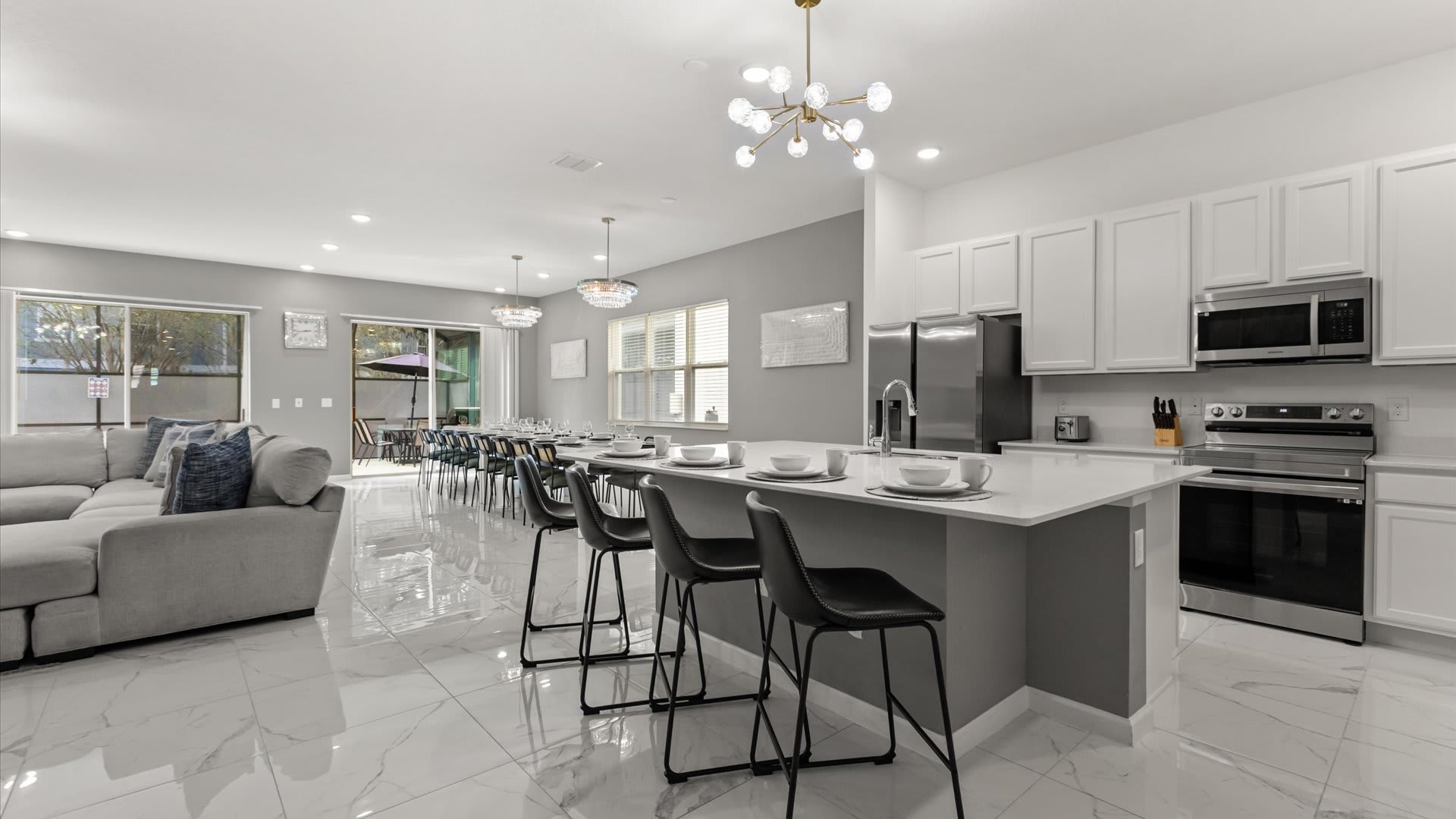 Kitchen: Fully equipped modern kitchen with stainless steel appliances, ample counter space, and everything you need for home-cooked meals.