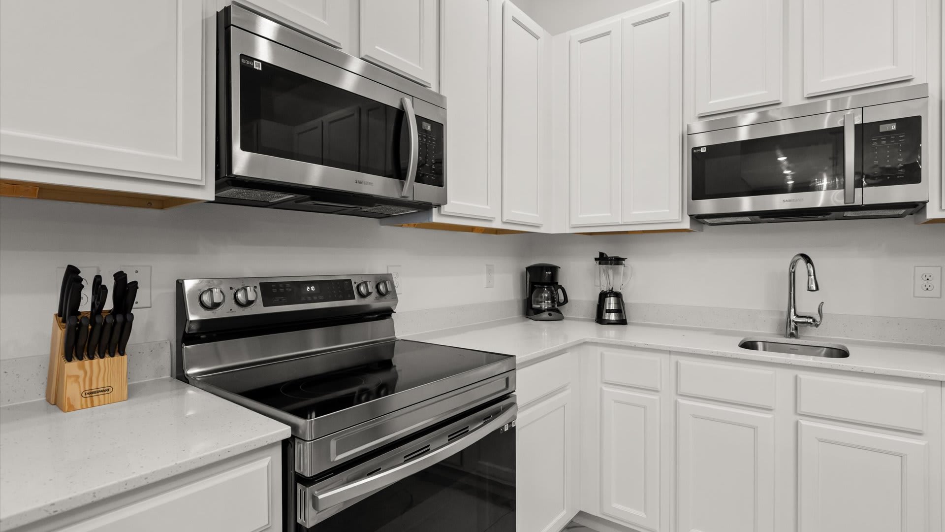 Kitchen: Fully equipped modern kitchen with stainless steel appliances, ample counter space, and everything you need for home-cooked meals.