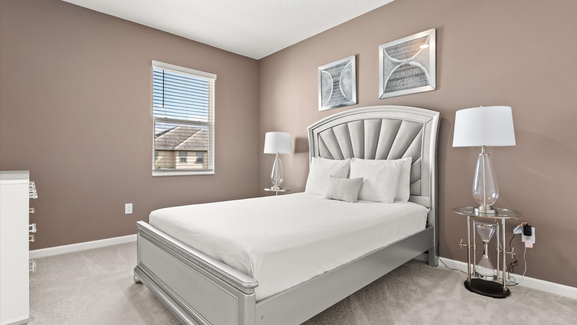 Bedroom 3: Cozy and inviting space with a Queen bed, a smart TV, an ensuite bathroom, and soft modern tones for restful nights.