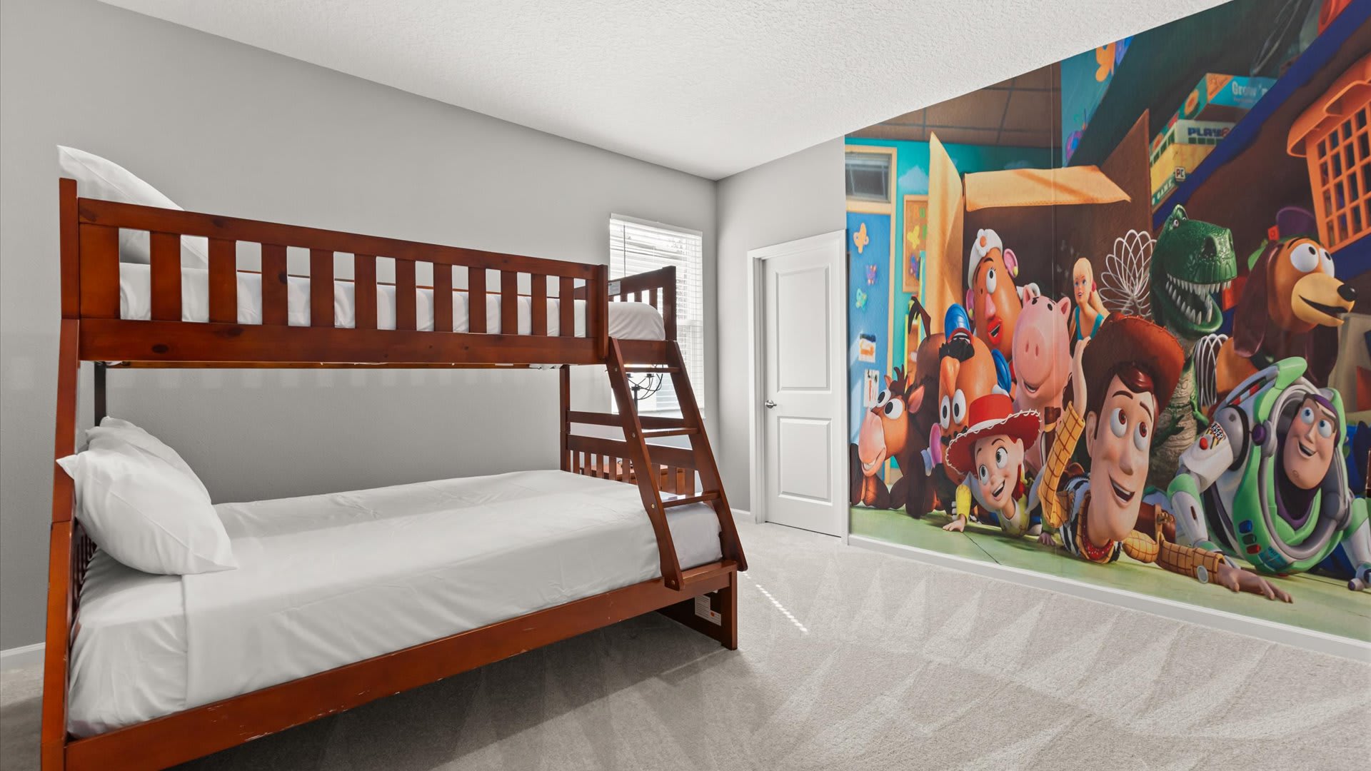 Bedroom 11 – Toy Story Themed Room: Fun and playful room featuring Toy Story characters, bunk beds, and vibrant decor your kids will absolutely love!
