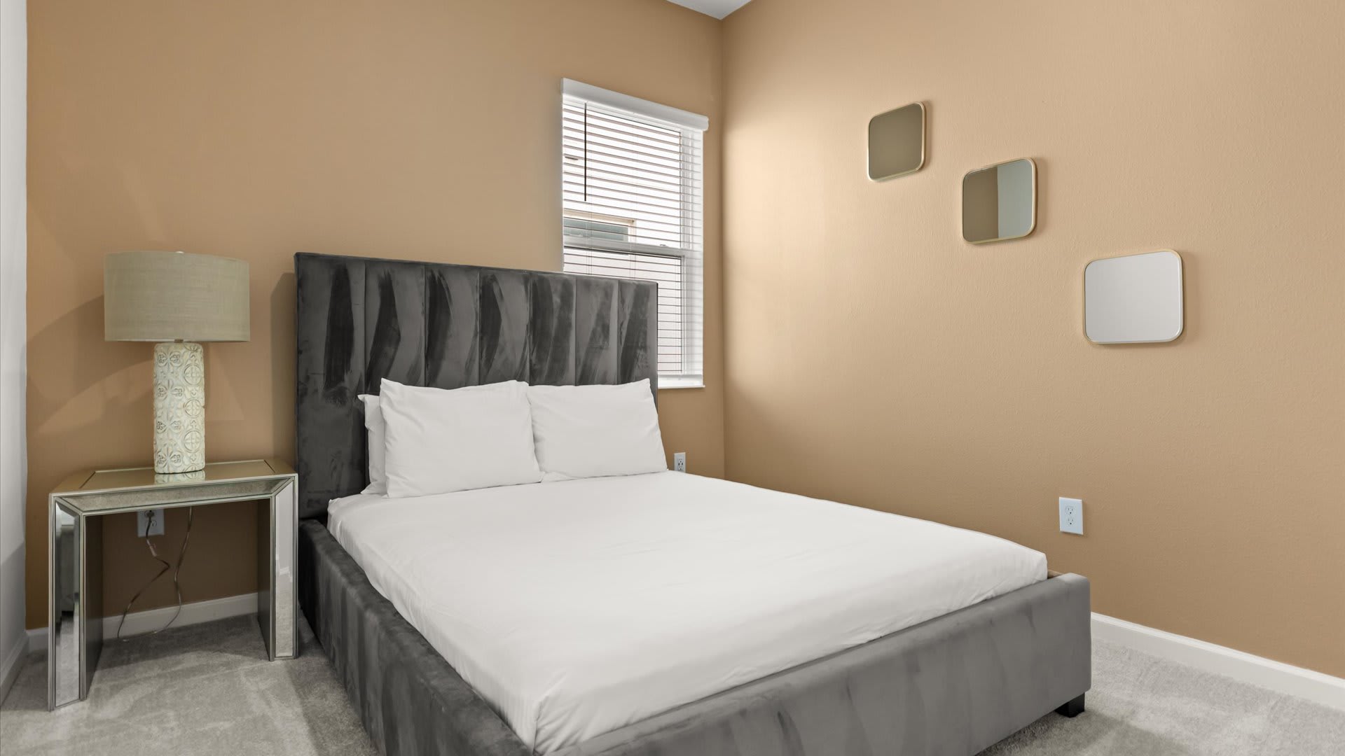 Bedroom 8: Simple yet comfortable queen bedroom with soft lighting and neutral decor, perfect for relaxing at the end of the day.