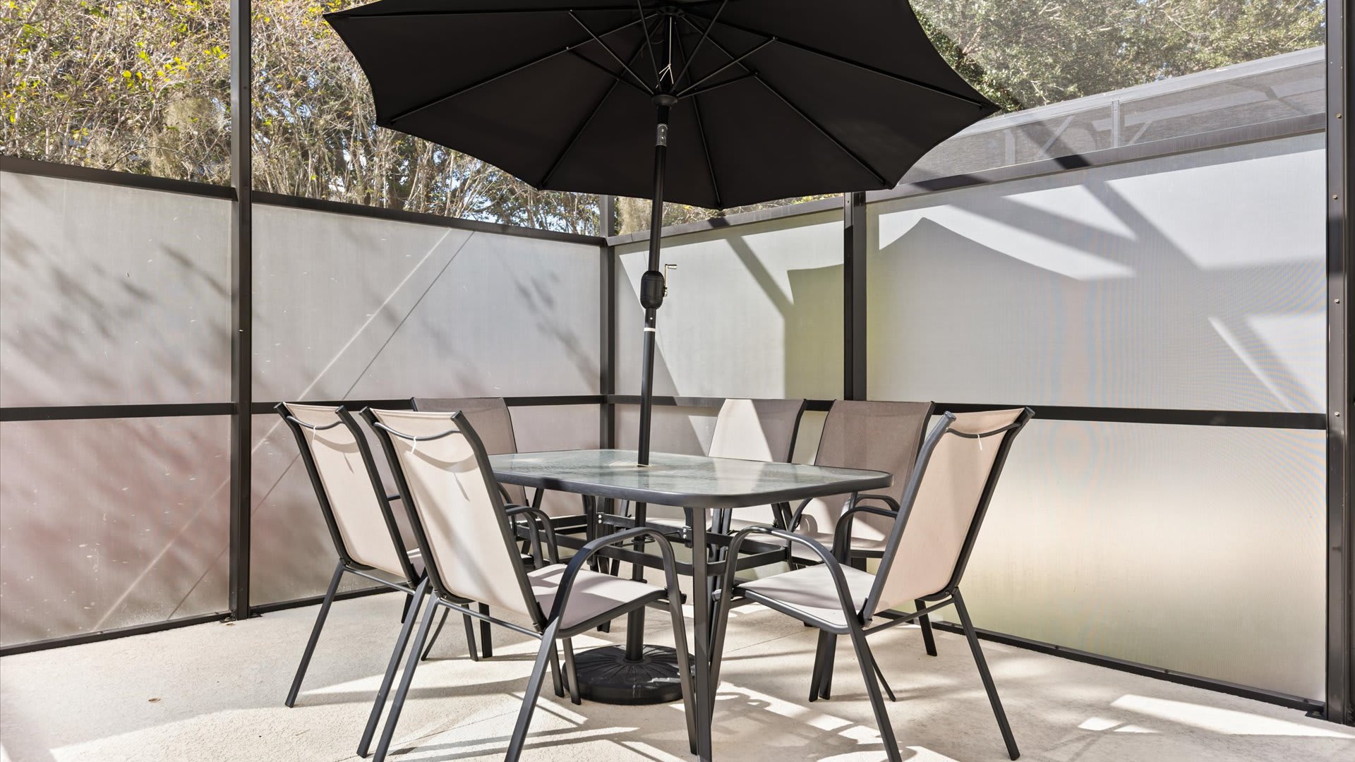 Outdoor patio dining area with umbrella