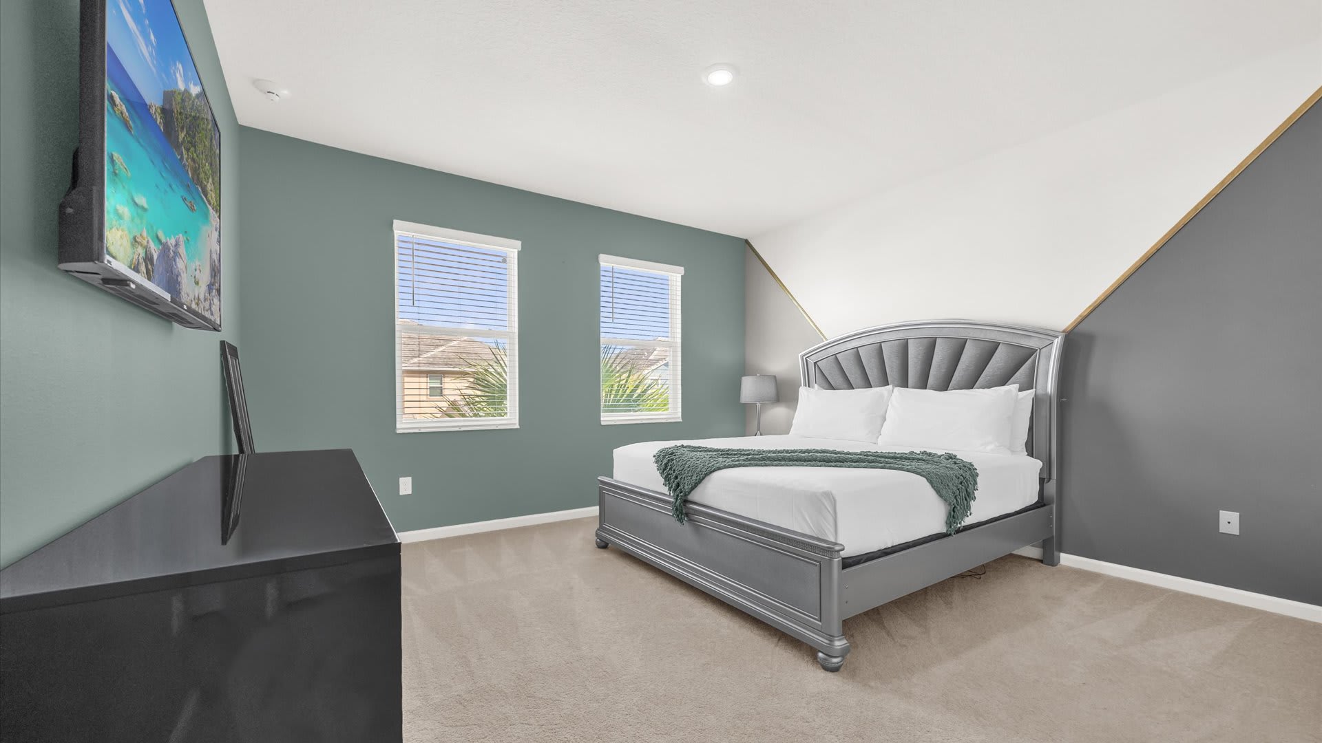 King Suite – Beautiful king bed, smart TV, and ensuite bathroom.