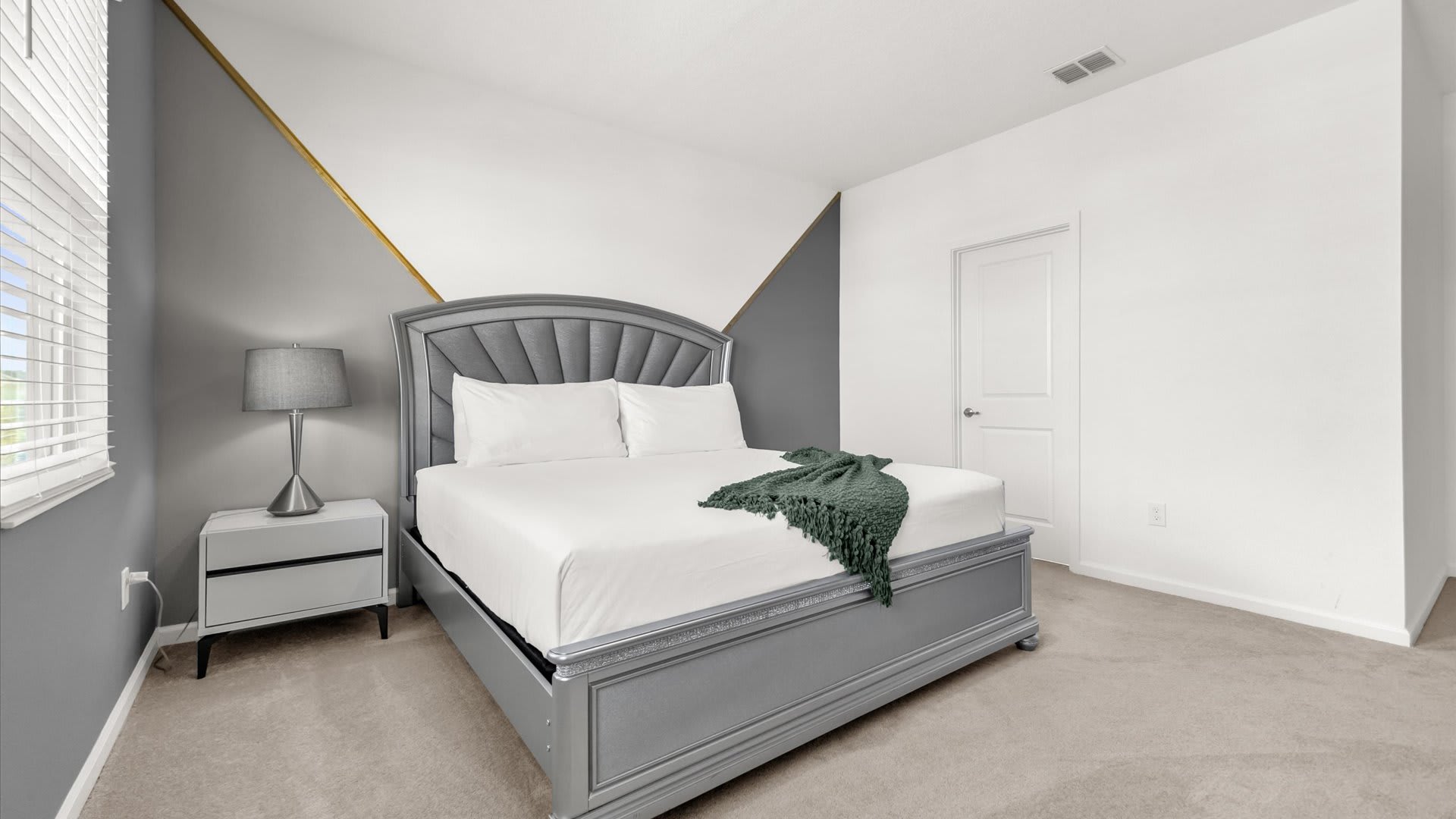 Bedroom 4 – Queen Suite – Spacious bedroom with plush bedding and ensuite bath.