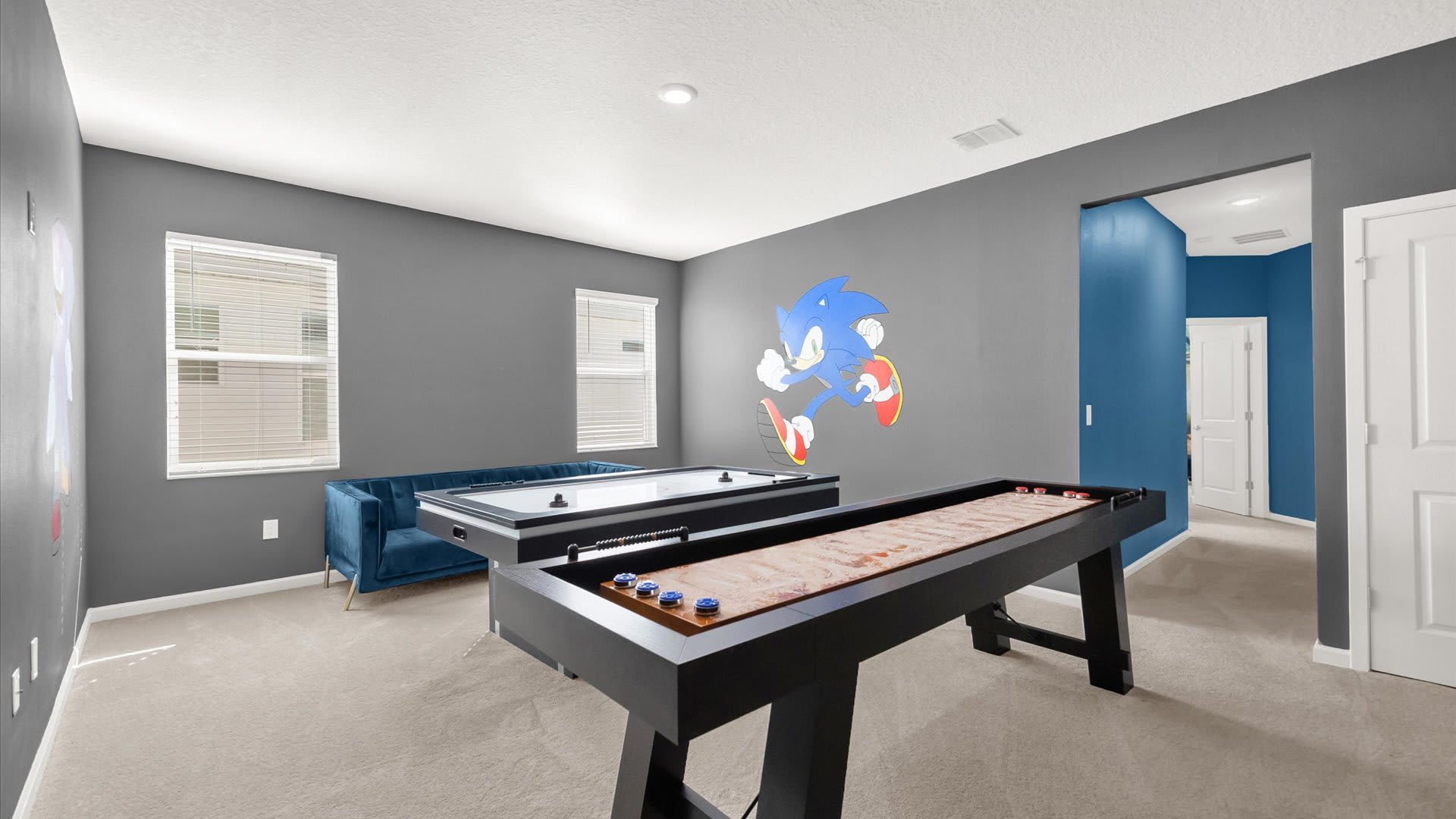 Game Room with Air Hockey & Foosball – Perfect for hours of family fun and friendly competition.