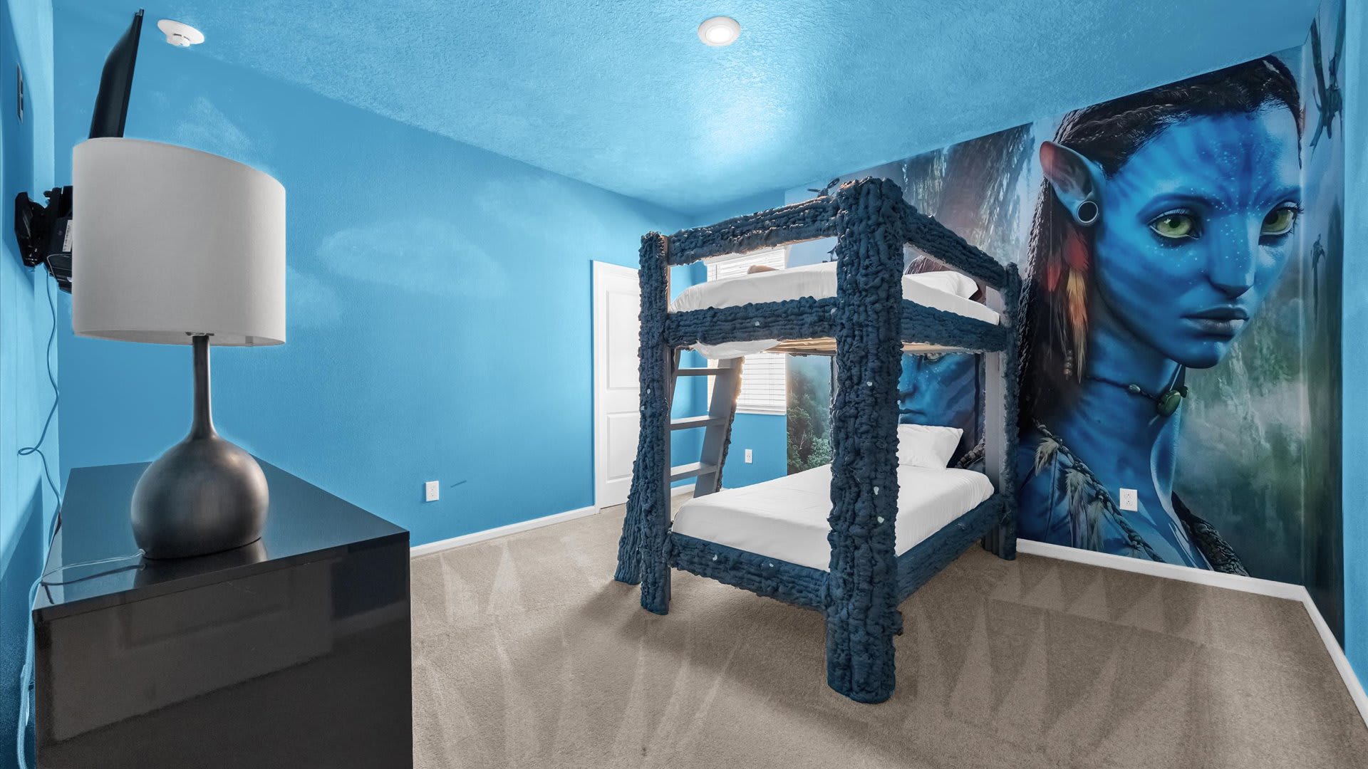 Bedroom 11 – Avatar-Themed Bunk Room – Immersive design with twin bunks and custom artwork.