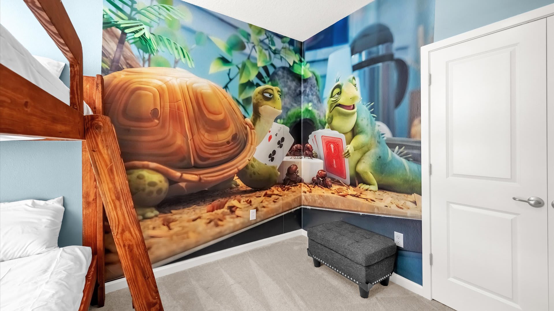 Bedroom 12 – Ninja Turtle-Themed Bunk Room – Colourful ocean-inspired mural and twin bunks for kids.