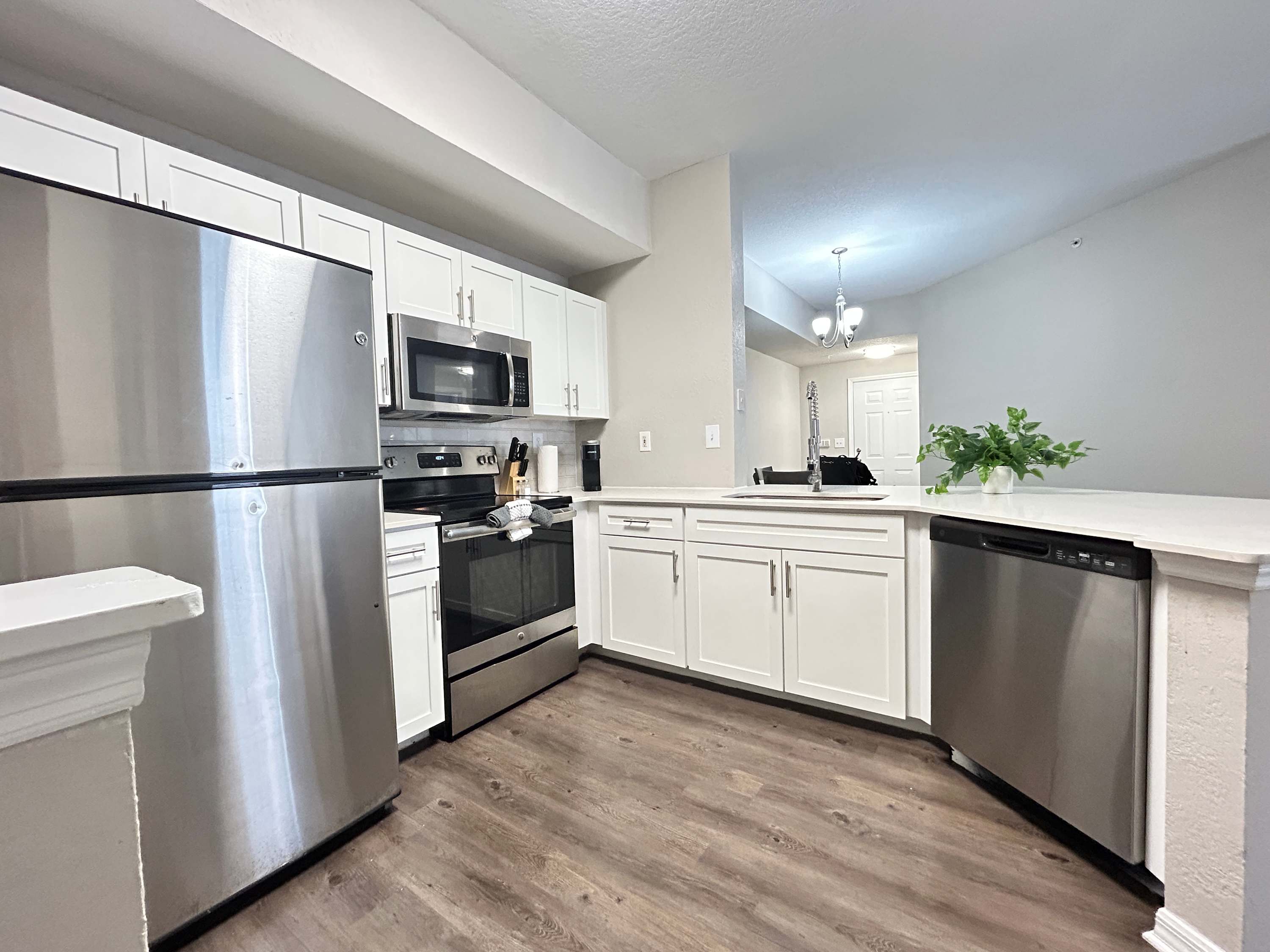 2 BR with Private Garage, Boutique Shops & Pond Views