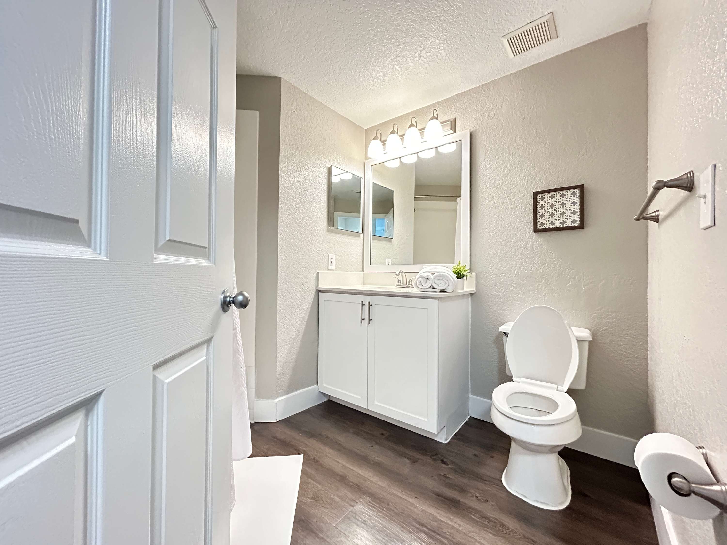 2 BR with Private Garage, Boutique Shops & Pond Views