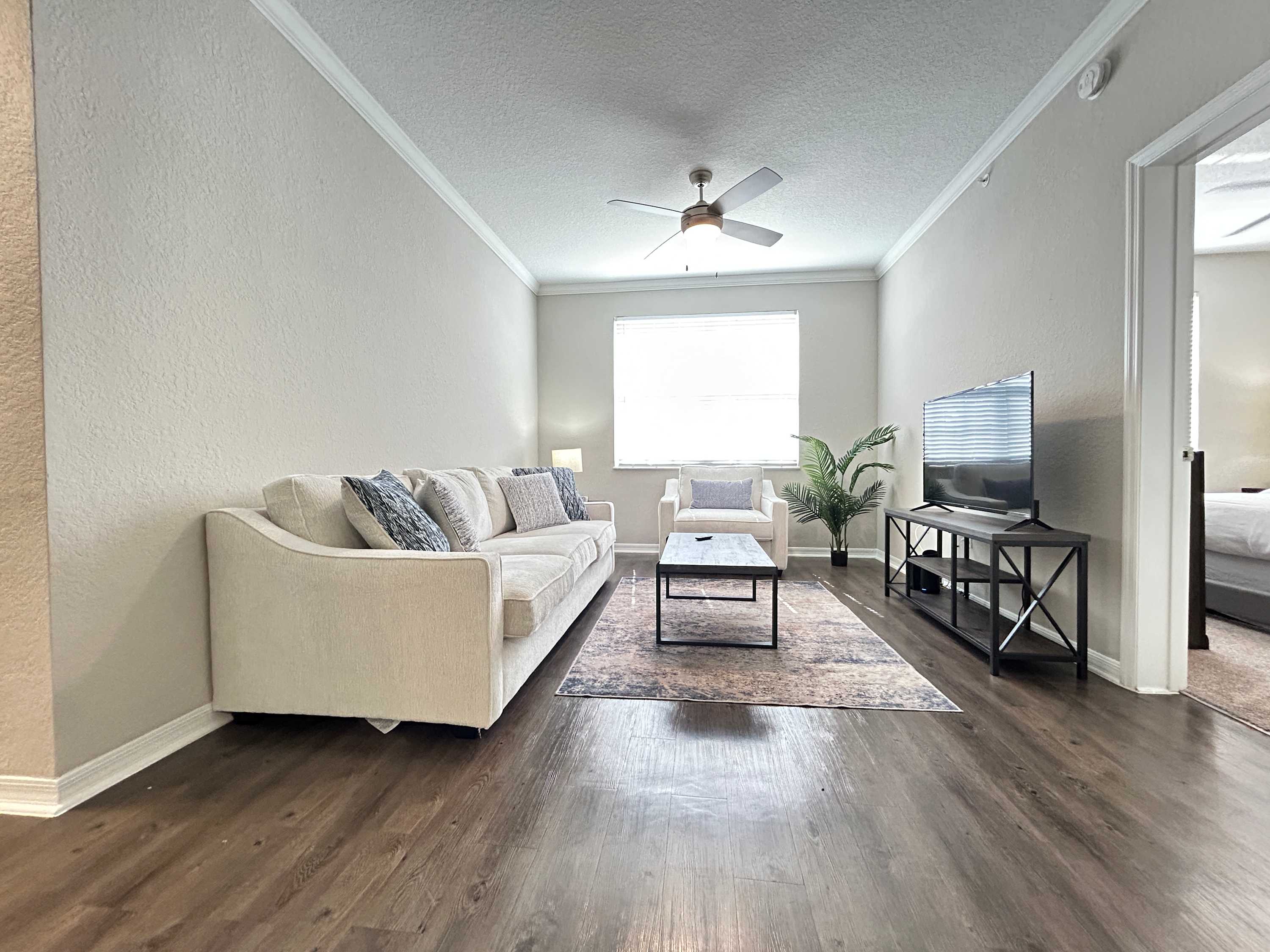 2 BR with Private Garage, Boutique Shops & Pond Views