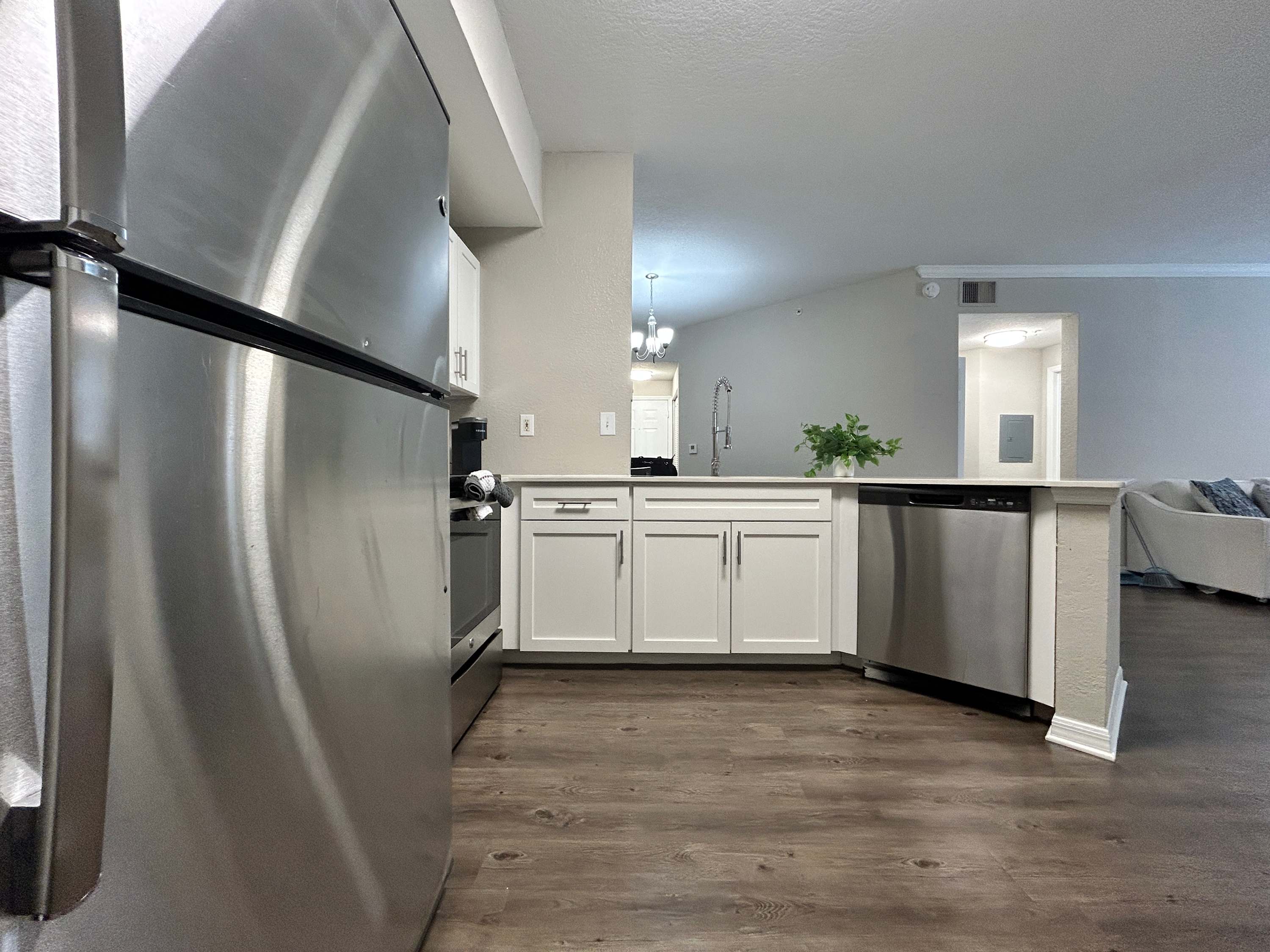 2 BR with Private Garage, Boutique Shops & Pond Views