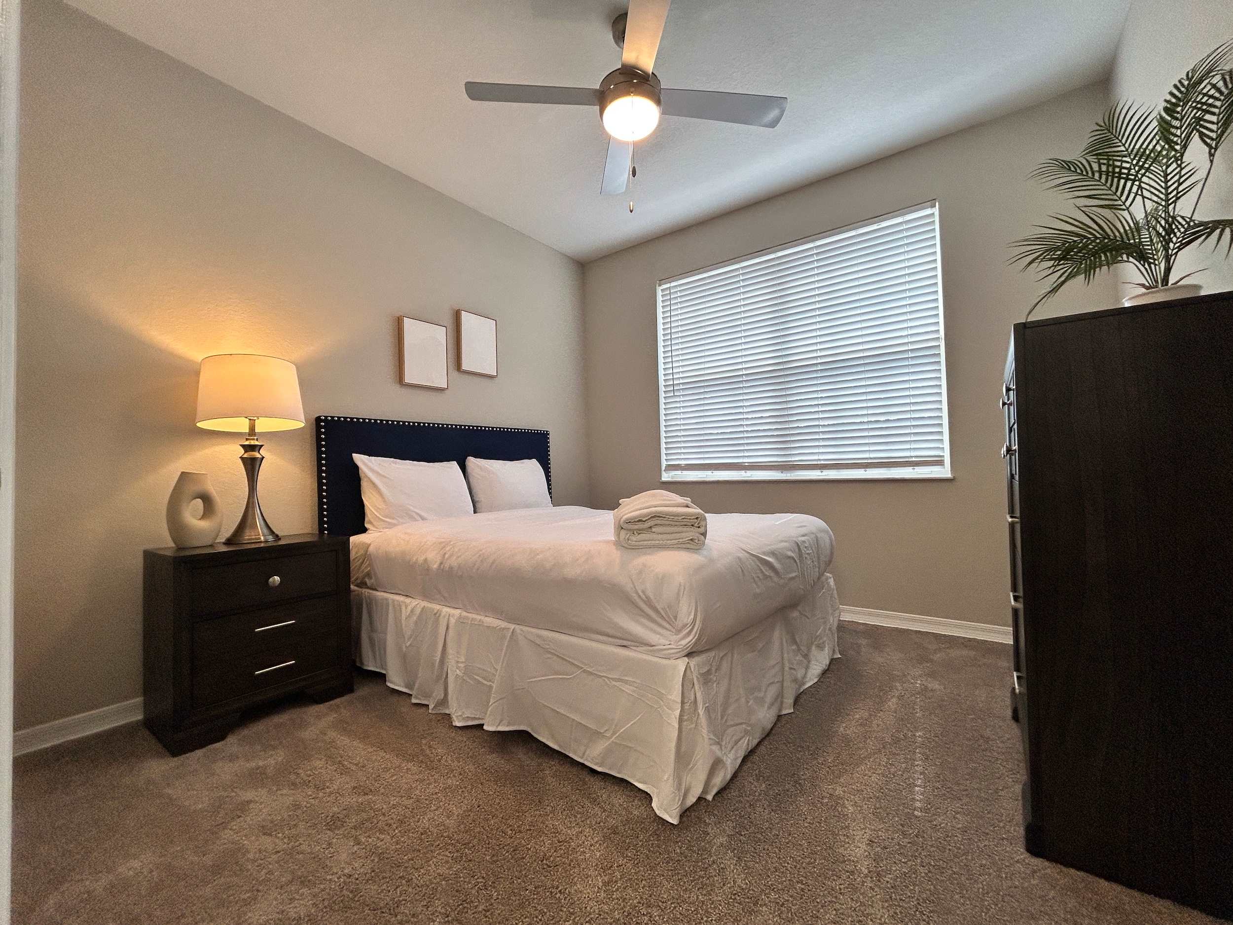 2 BR with Private Garage, Boutique Shops & Pond Views