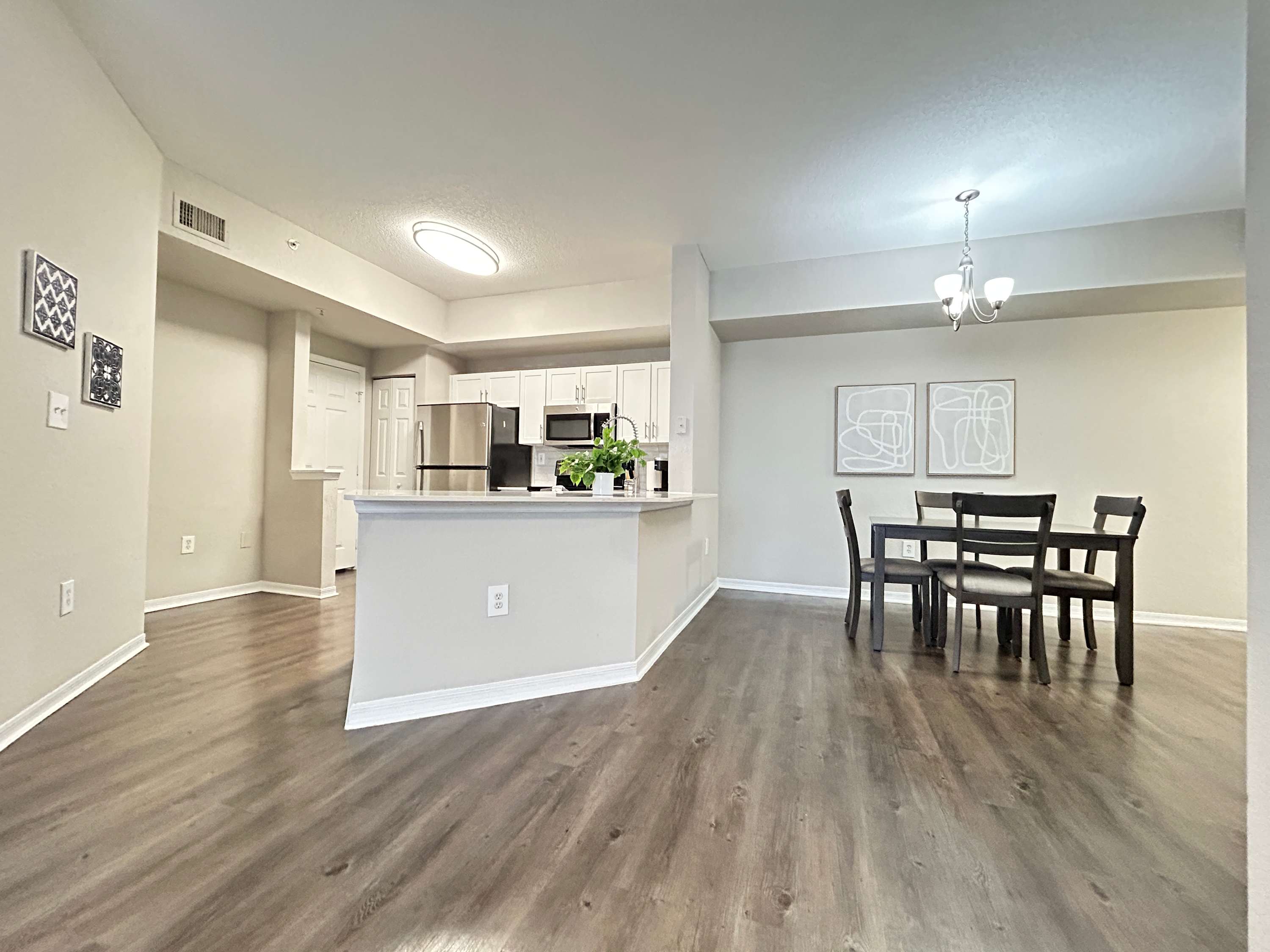 2 BR with Private Garage, Boutique Shops & Pond Views