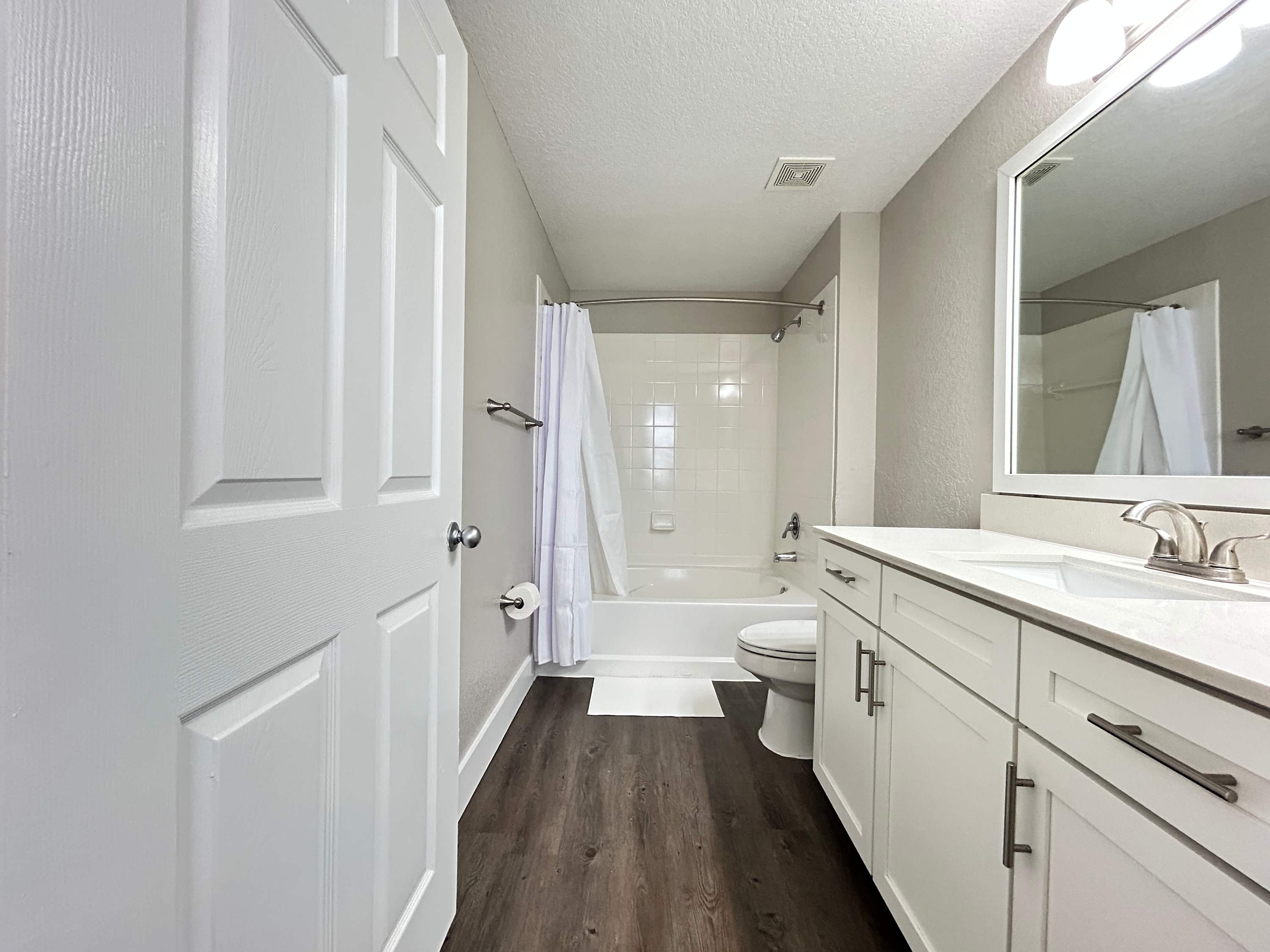 2 BR with Private Garage, Boutique Shops & Pond Views