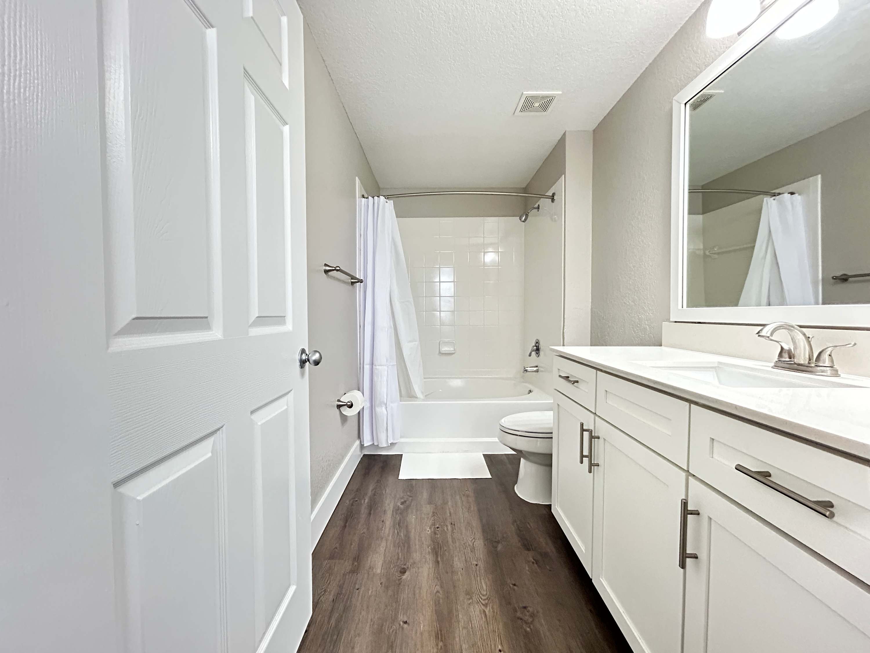 2 BR with Private Garage, Boutique Shops & Pond Views