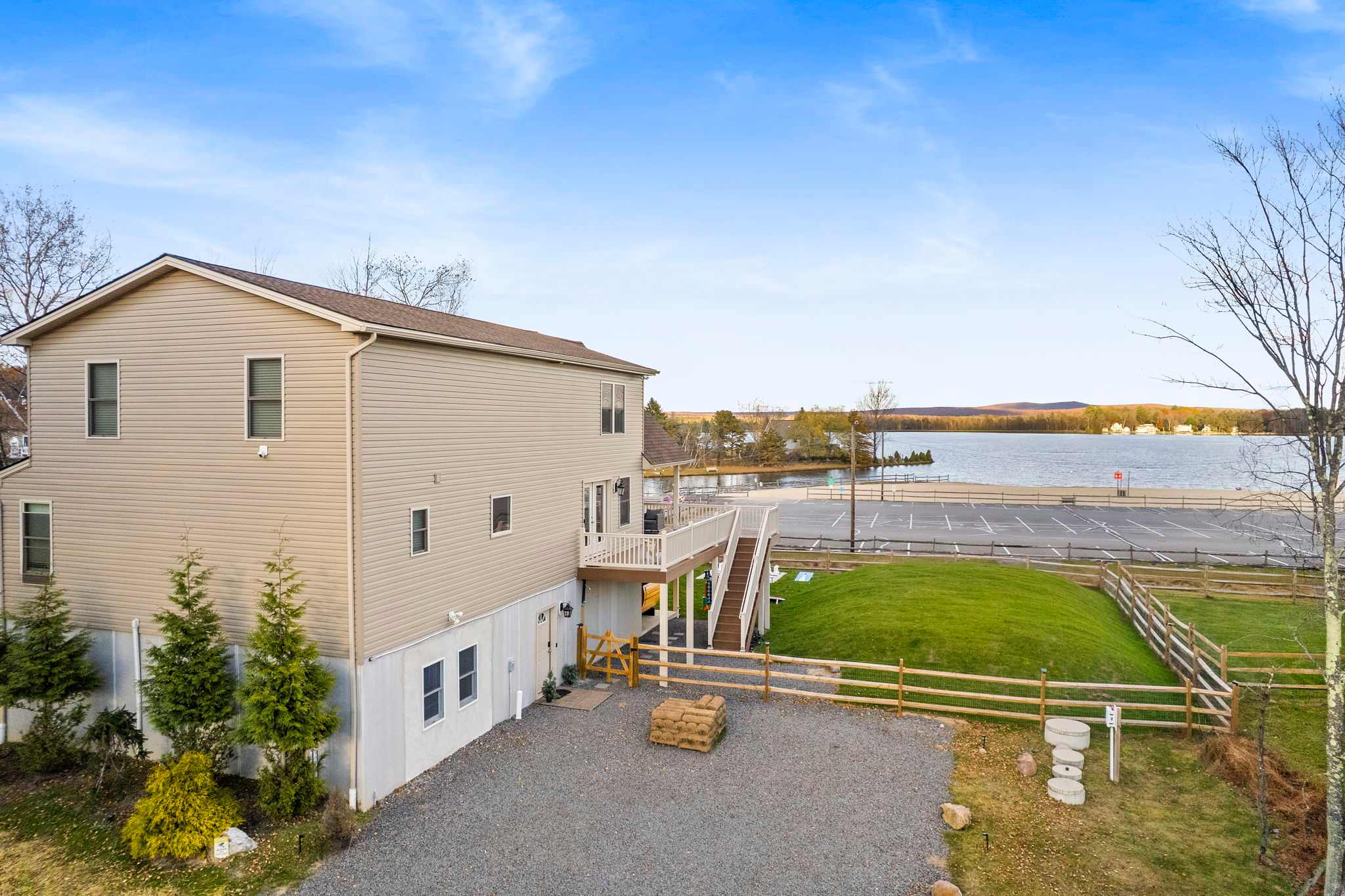 Crisp blue skies, snowy lake views, and open space behind the house that leads straight to peaceful waterfront vibes.