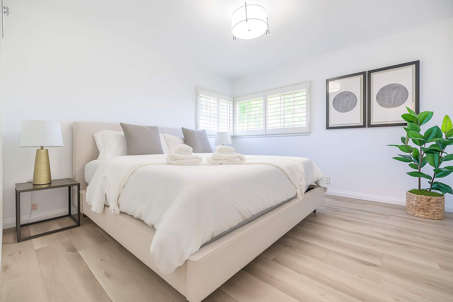 Cozy bedroom with soft lighting and fresh linens