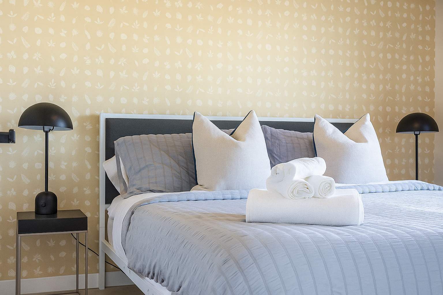 Cozy bed with soft linens