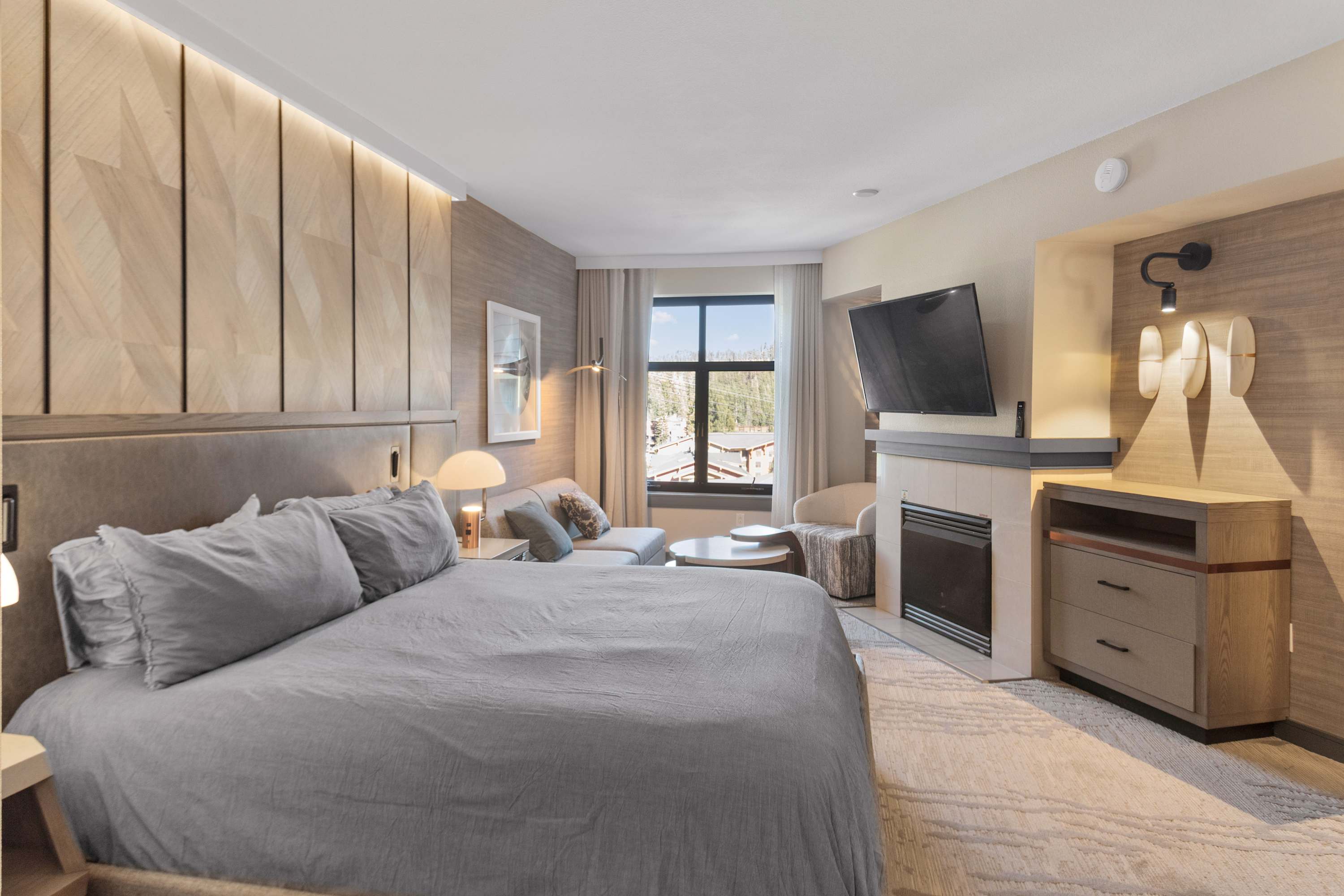 Charming studio with king bed, fireplace, and kitchenette.