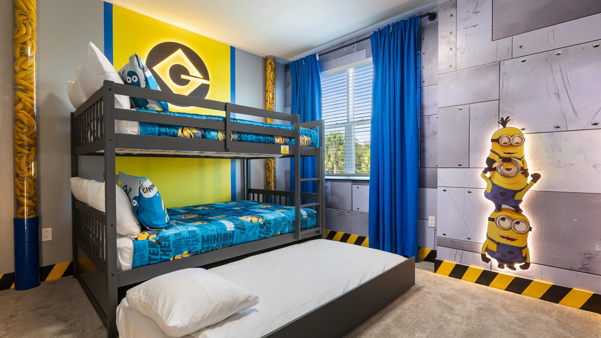 Fun Minions themed bunk bedroom with a single bed perfect for children
