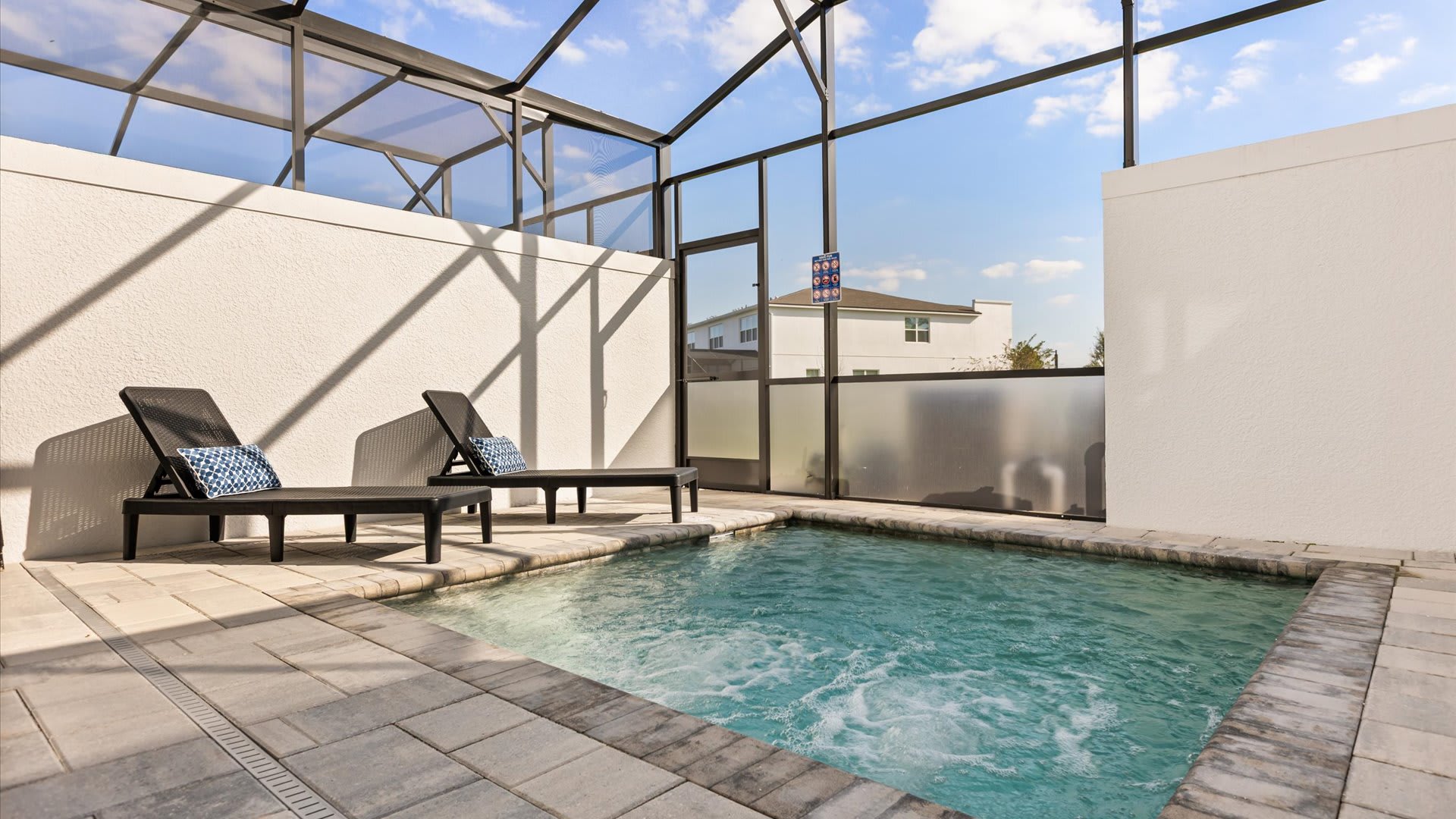 Private outdoor swimming pool and patio