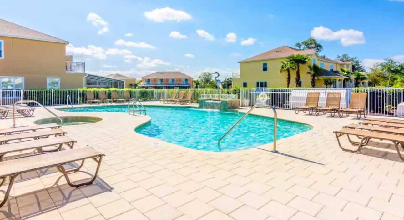 Resort Outdoor Community Pool with Sun Loungers