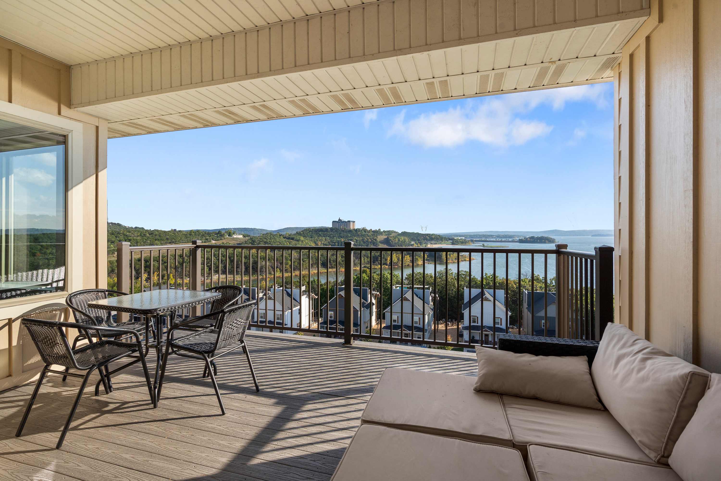 Lounge the day away or dine alfresco with stunning lake views on the balcony​