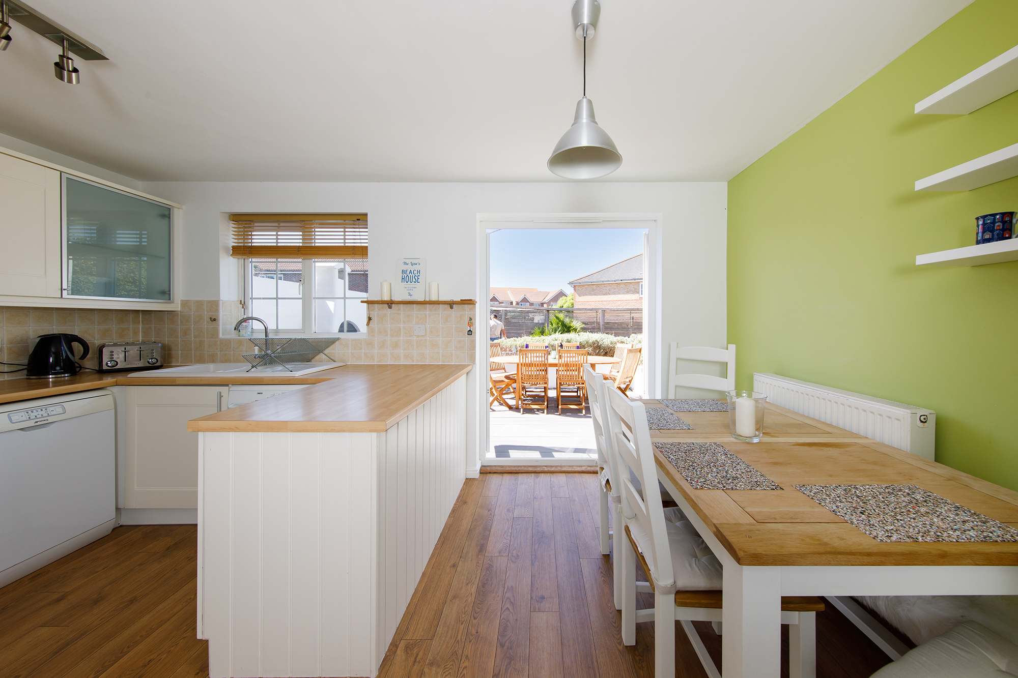 The spacious kitchen diner opens out to the beautiful garden.