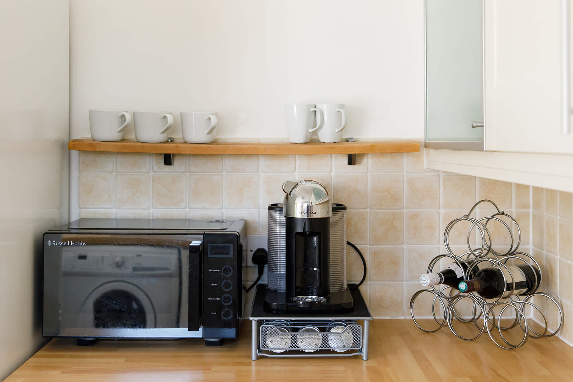 You'll find a coffee machine (Lavazza), microwave, fridge freezer and dishwasher.