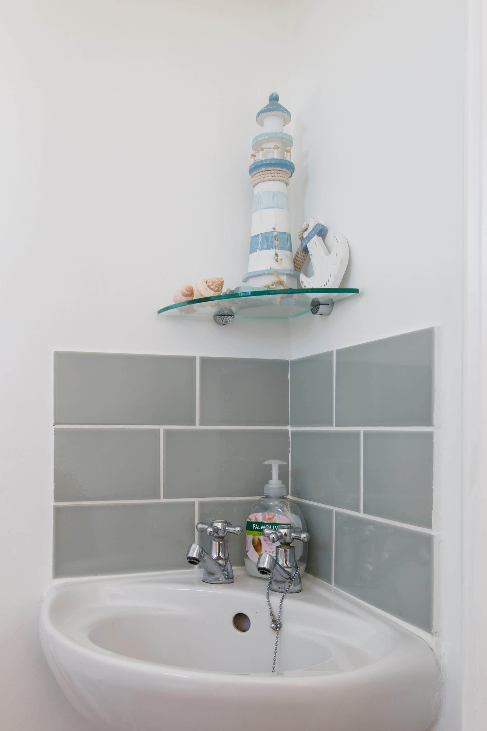 Freshen up in the downstairs cloakroom.