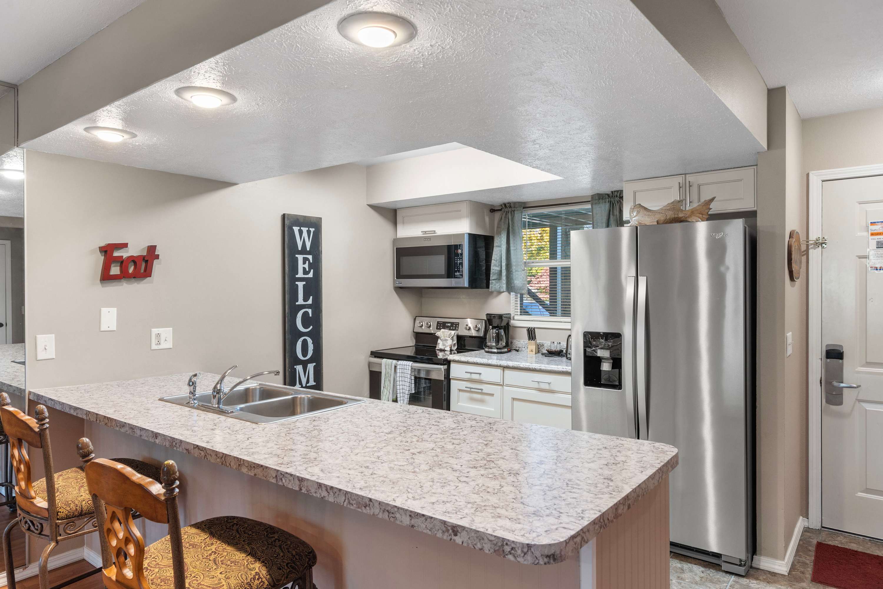 The open kitchen is well equipped for an unforgettable getaway​