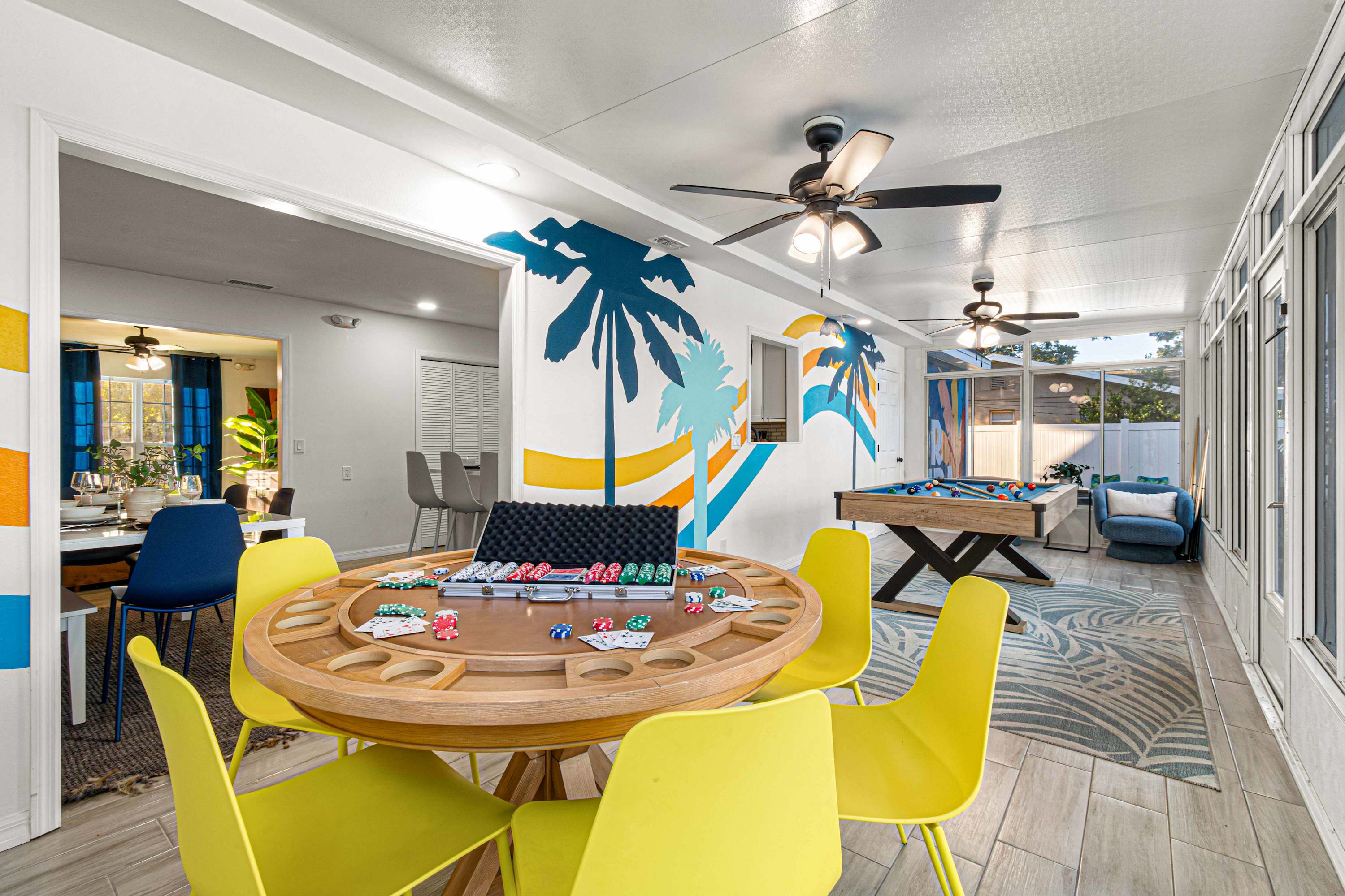 Game room with the poker table and the pool table