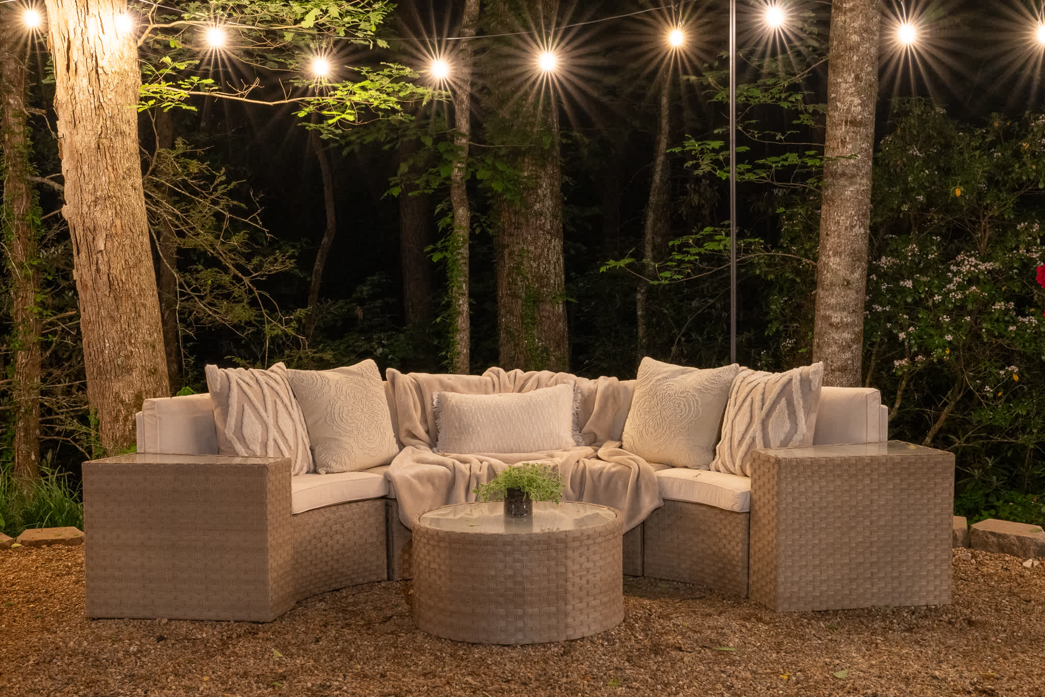 Snuggle up under the stars with soft pillows and glowing ambiance