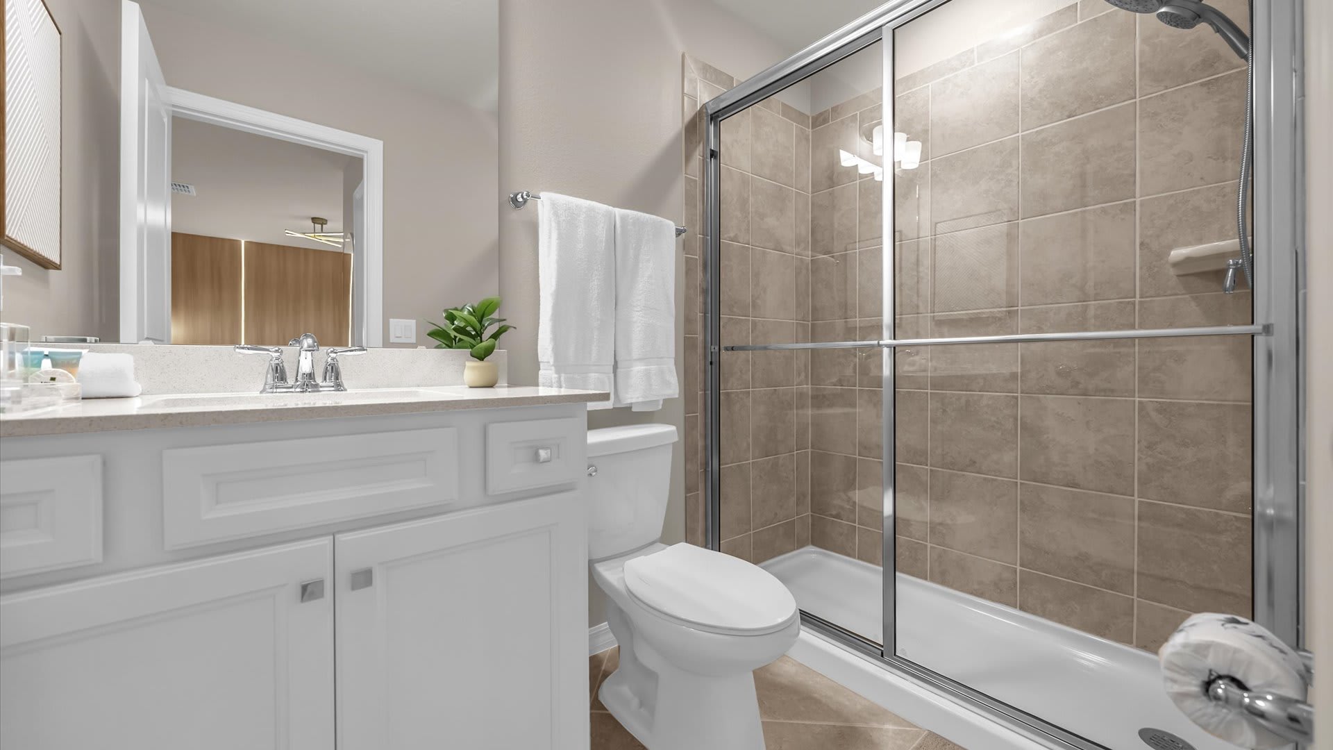 En-suite bathroom with a standing shower
