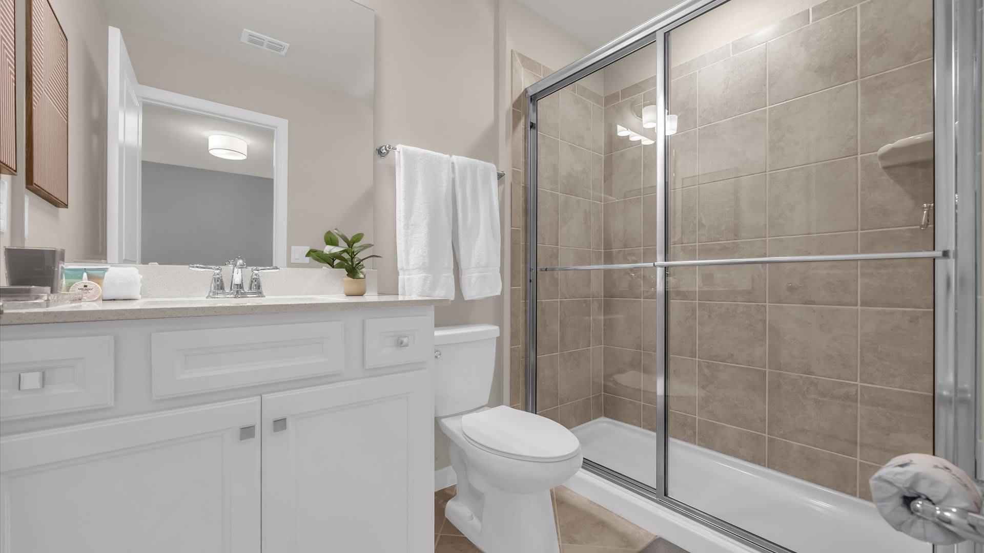En-suite bathroom with a standing shower