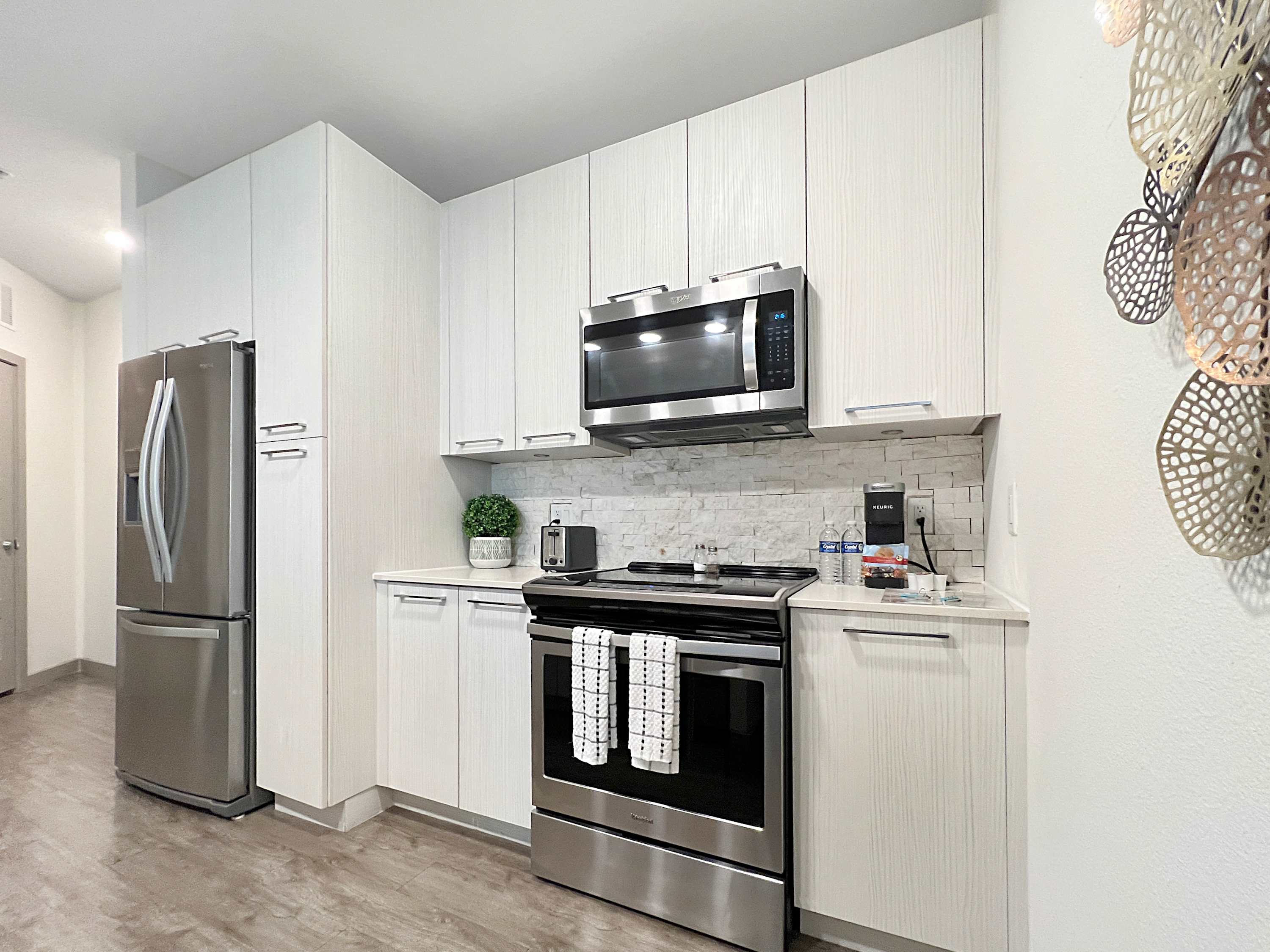 Waterfront Oasis: Modern 1 BR with Courtyard Views