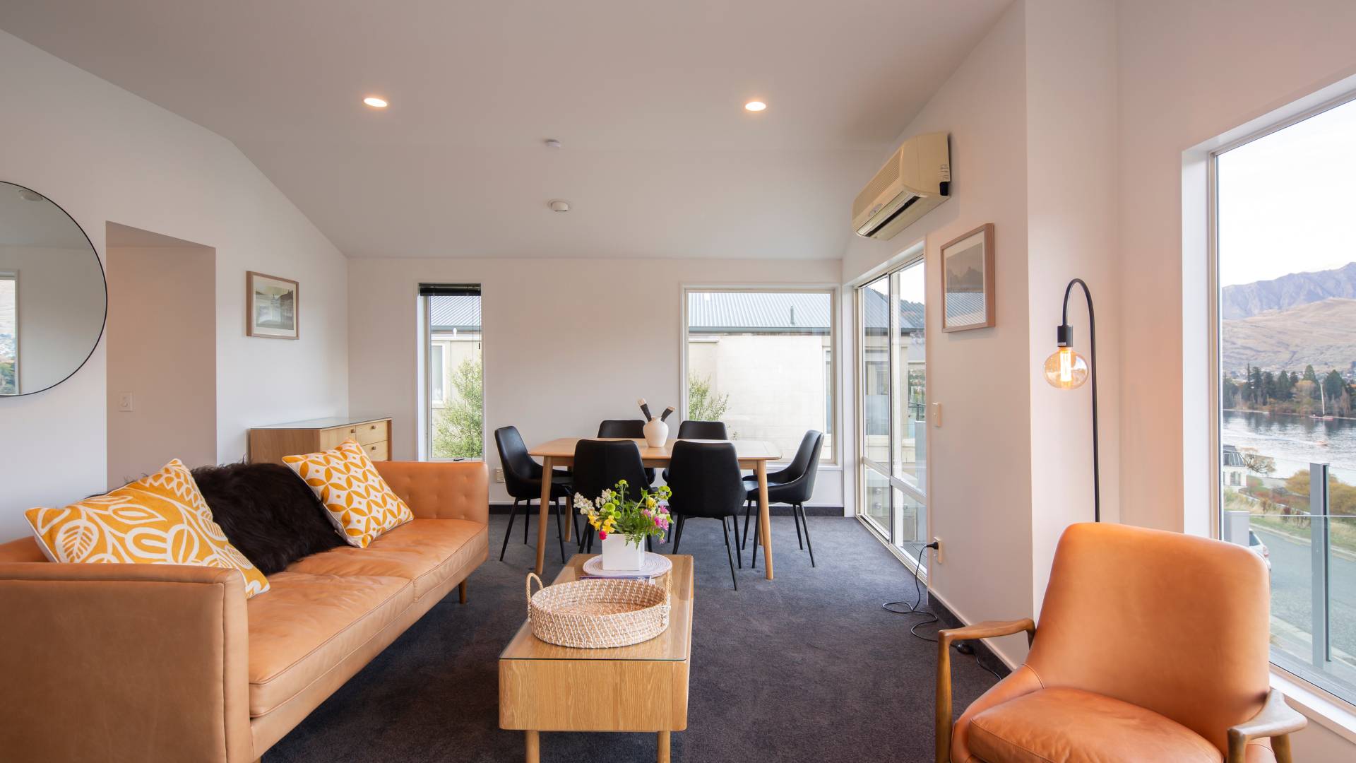 Lazing on comfortable seating at your Queenstown 2 bedroom accommodation