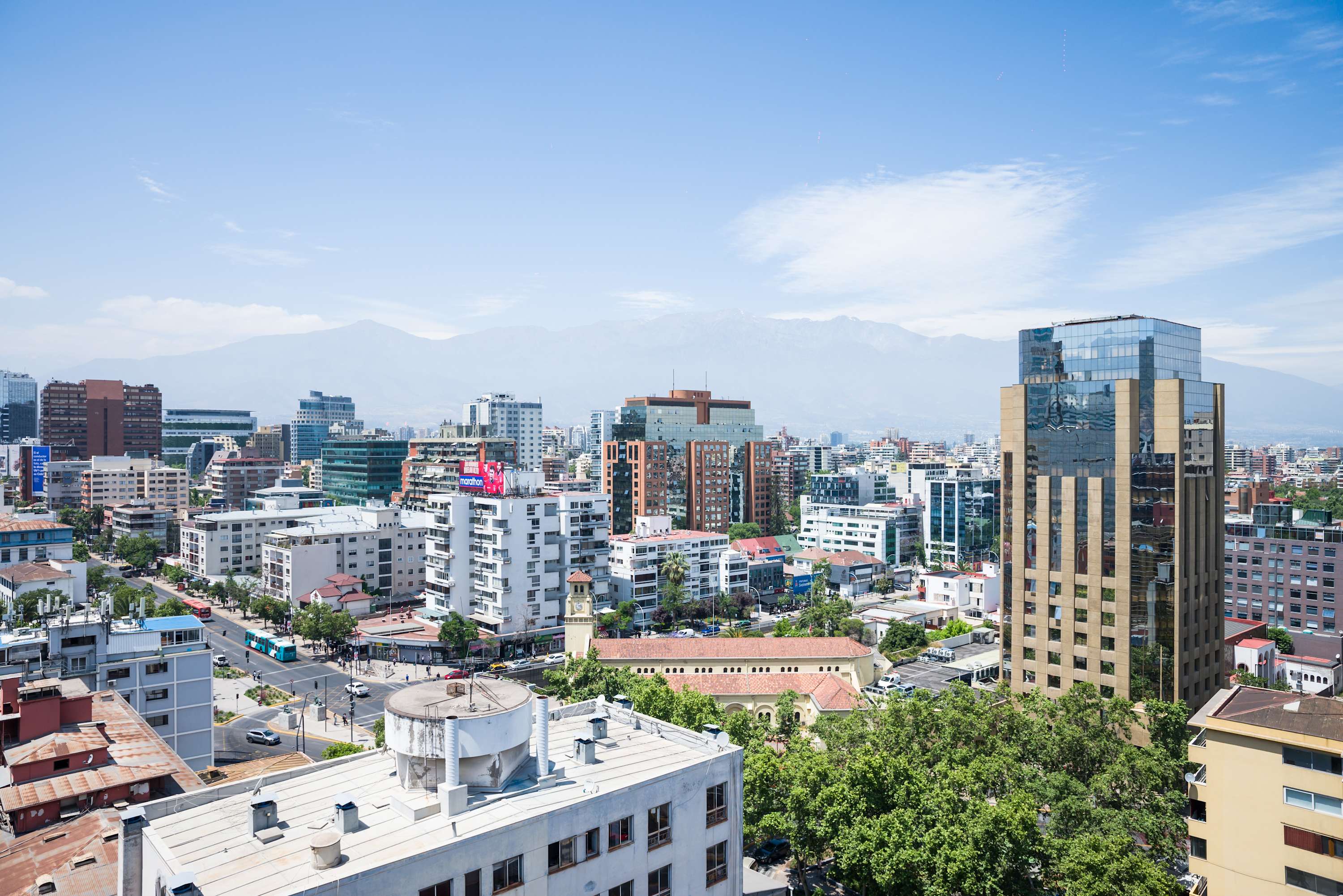 Enjoy breathtaking views of the city skyline and Andes mountains from your apartment.