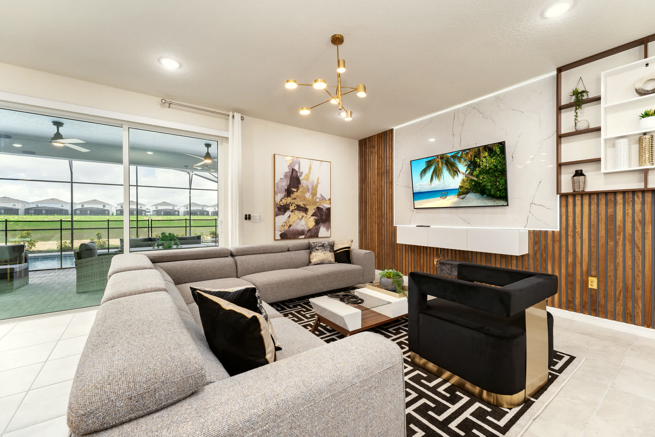 Relax in this stylish living room with a plush sectional and stunning outdoor views, perfect for unwinding after a day of adventure.