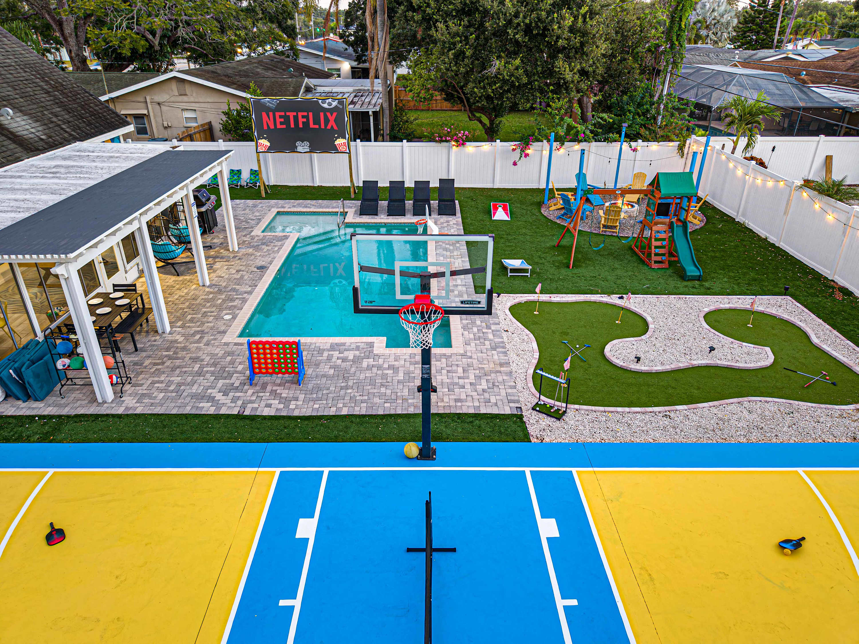 Aerial View of the backyard from the basketball + pickleball court